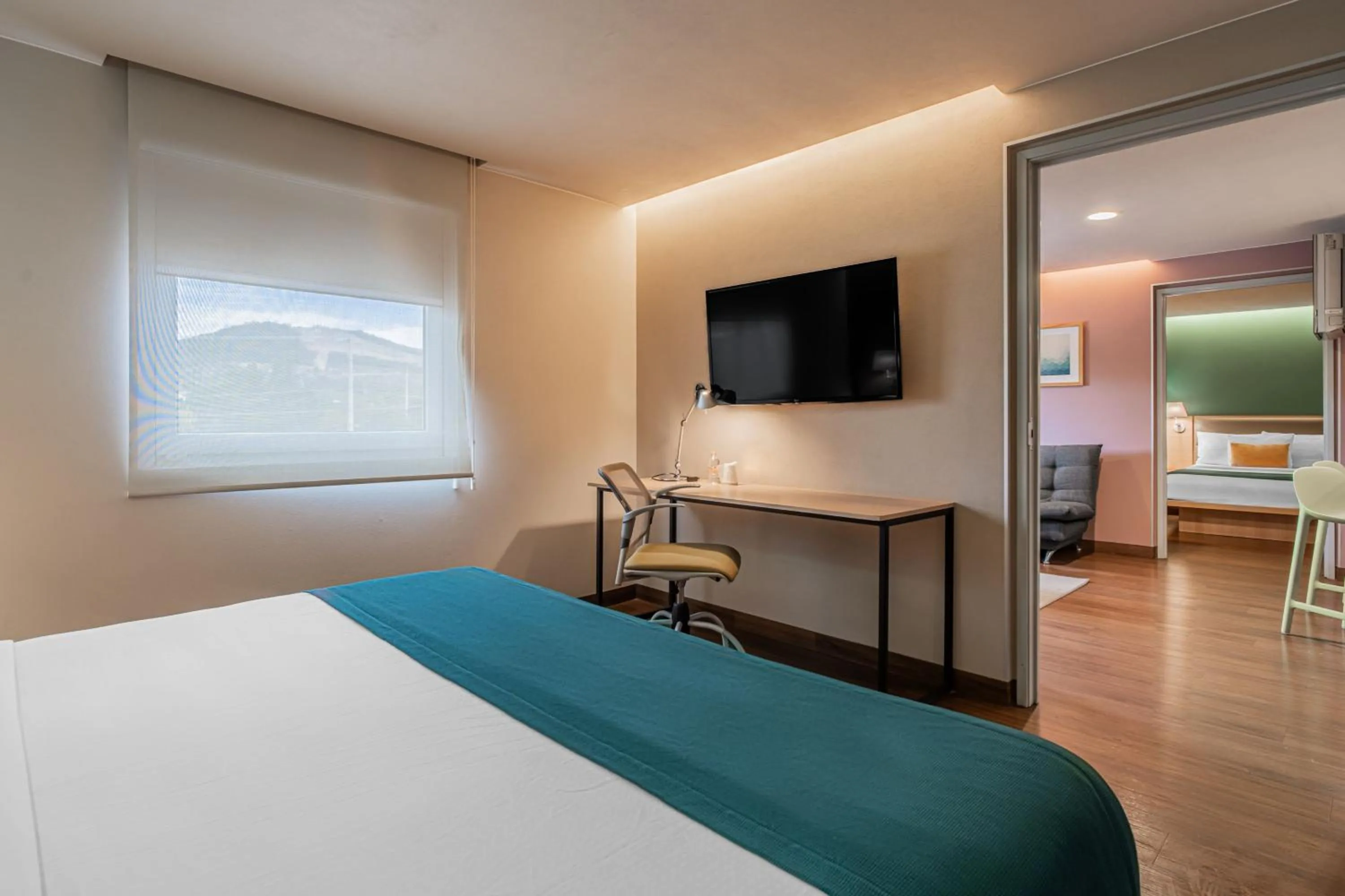 Bedroom, Bed in City Express Suites by Marriott Queretaro