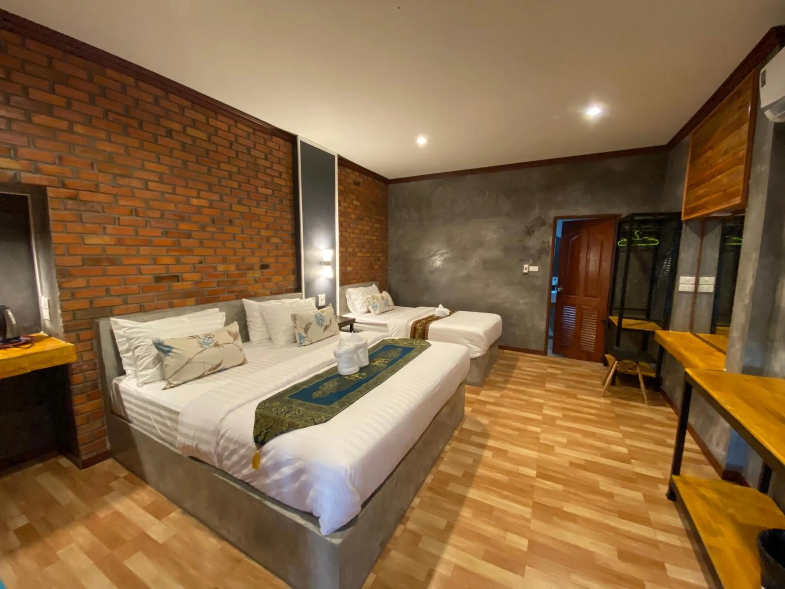 Bed in Khum Lanna Boutique Hotel