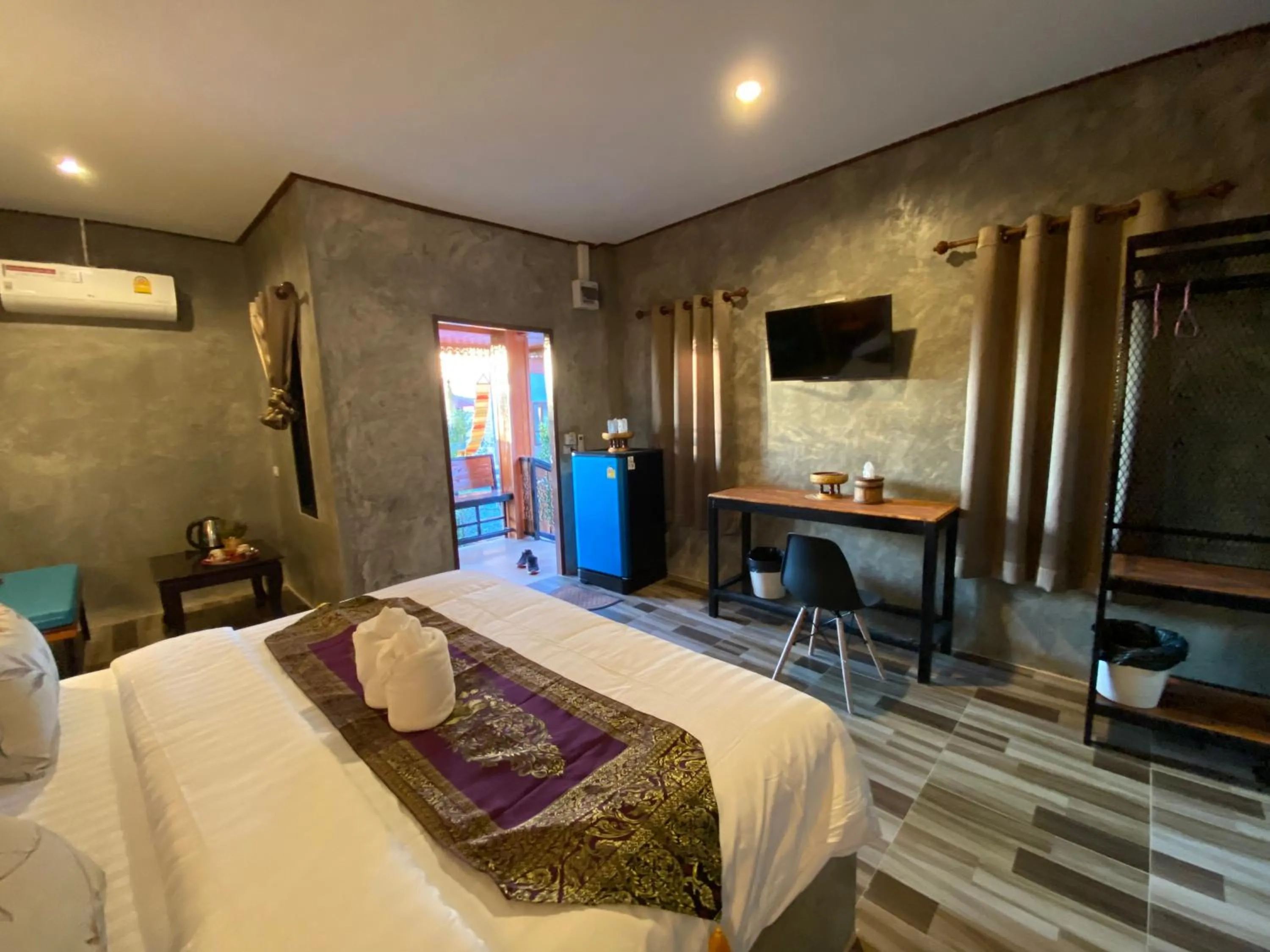 Bed in Khum Lanna Boutique Hotel