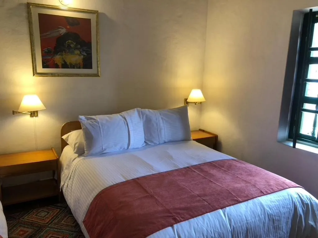 Bedroom, Bed in Hotel Hospederia San Carlos Villa De Leyva