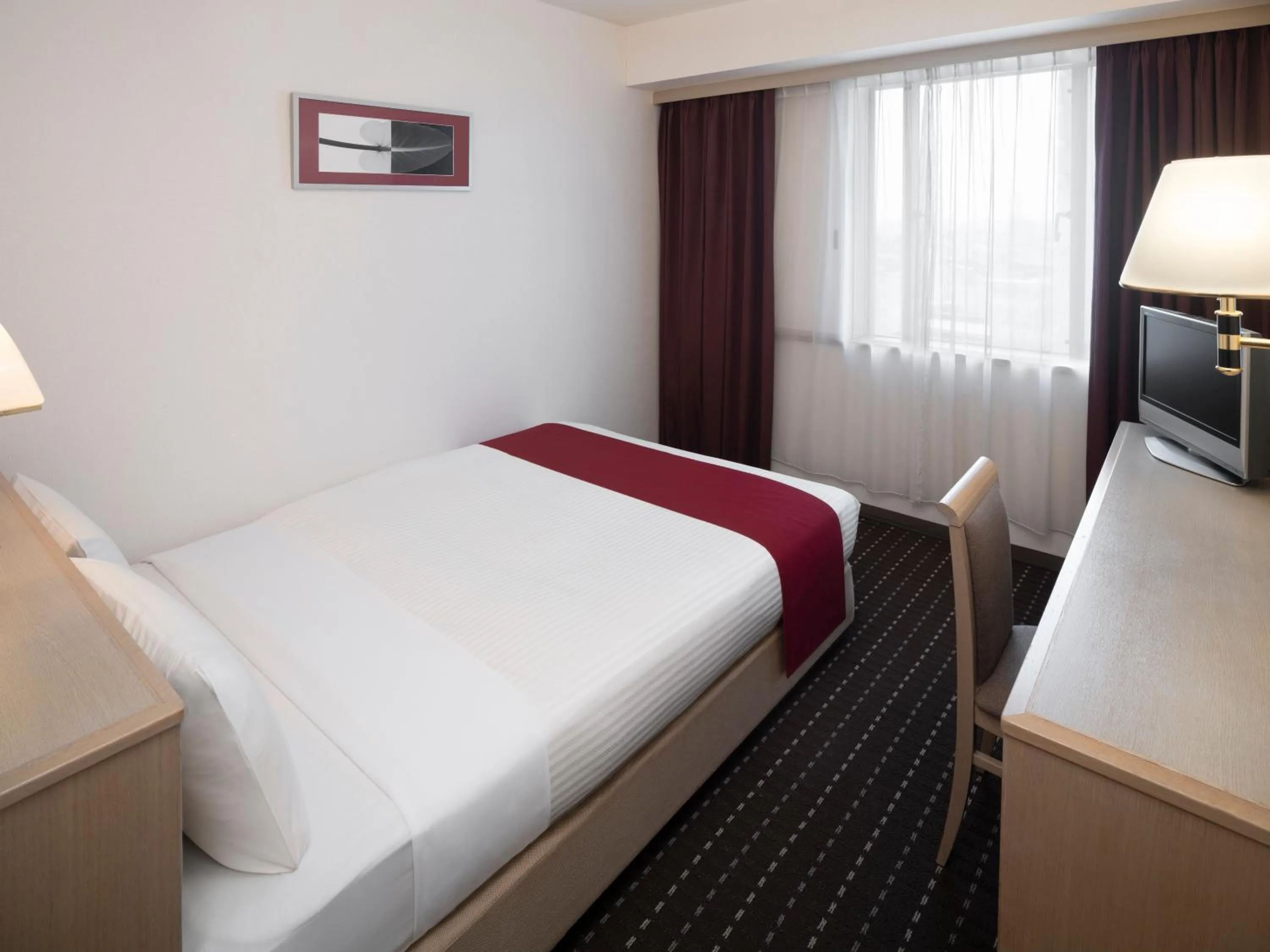 Bed in Art Hotel Joetsu