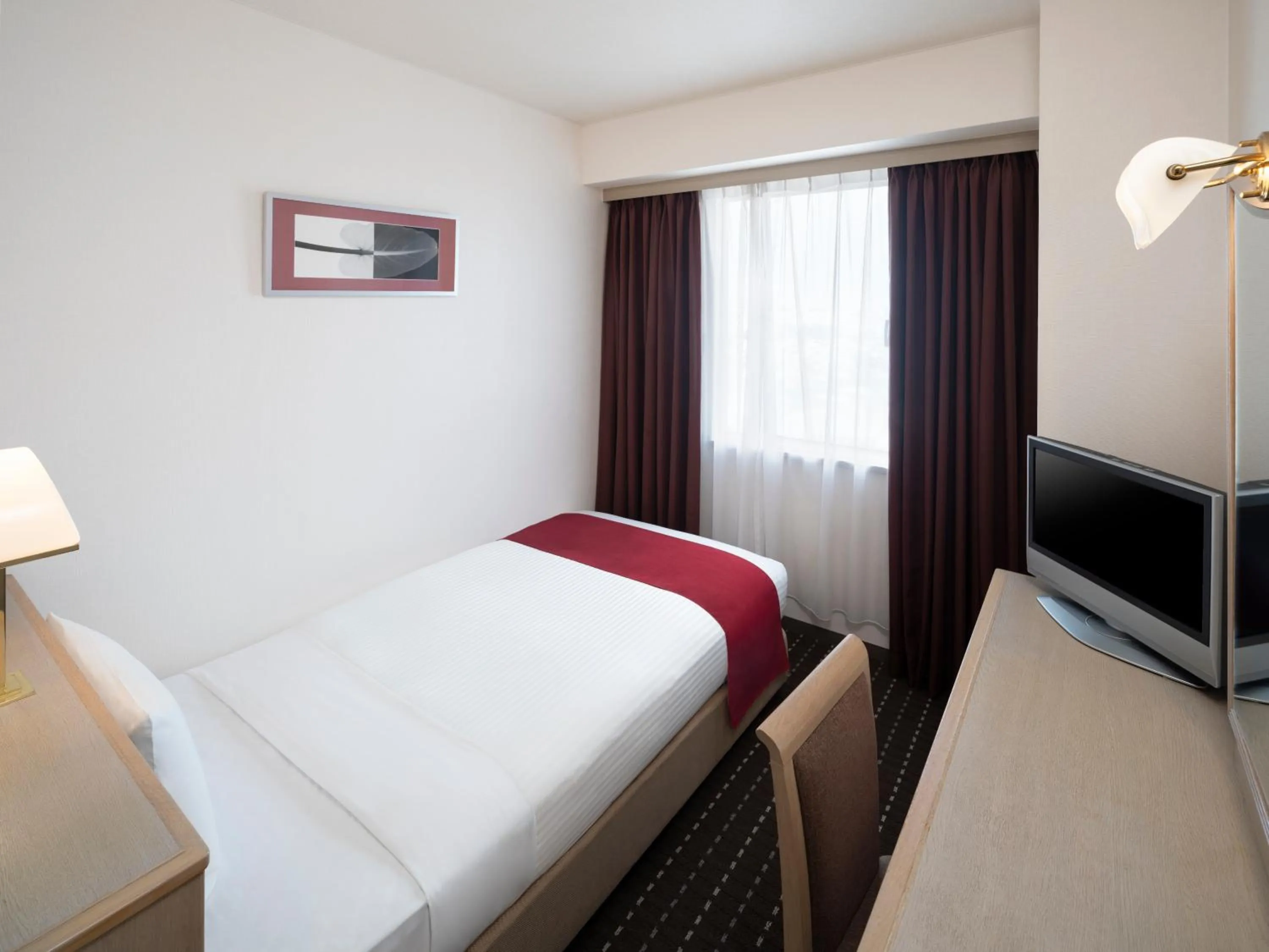 Bed in Art Hotel Joetsu