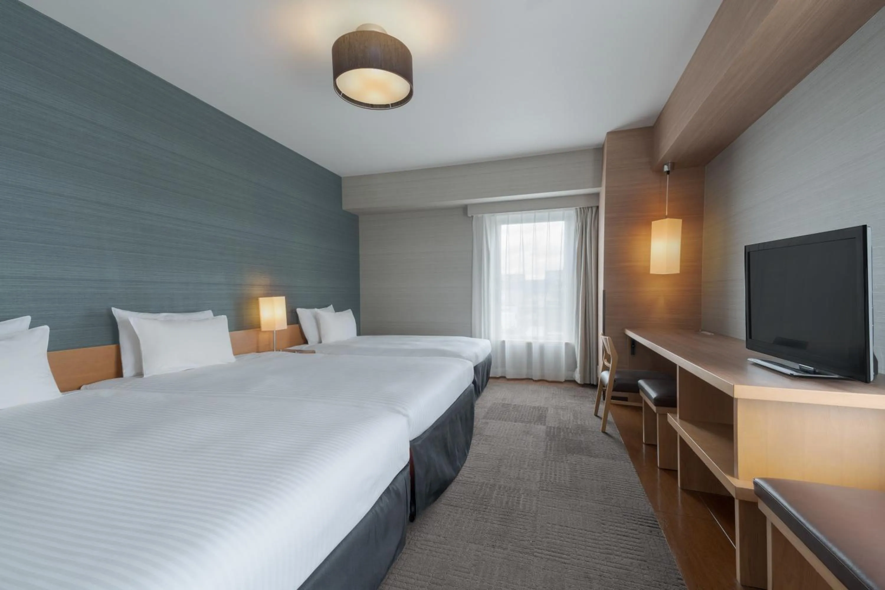 Photo of the whole room, Bed in Hotel Resol Trinity Hakata