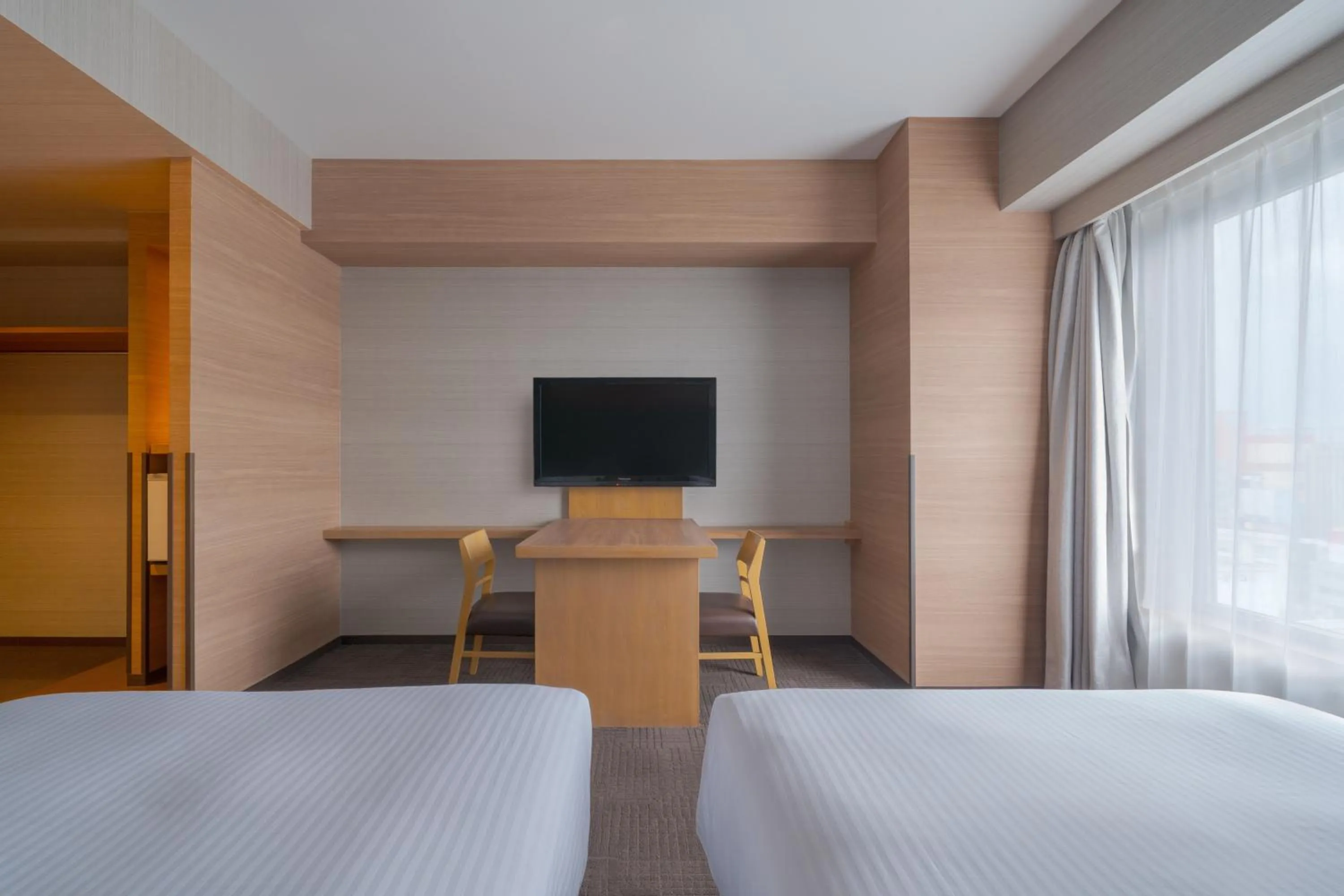 Photo of the whole room, Bed in Hotel Resol Trinity Hakata