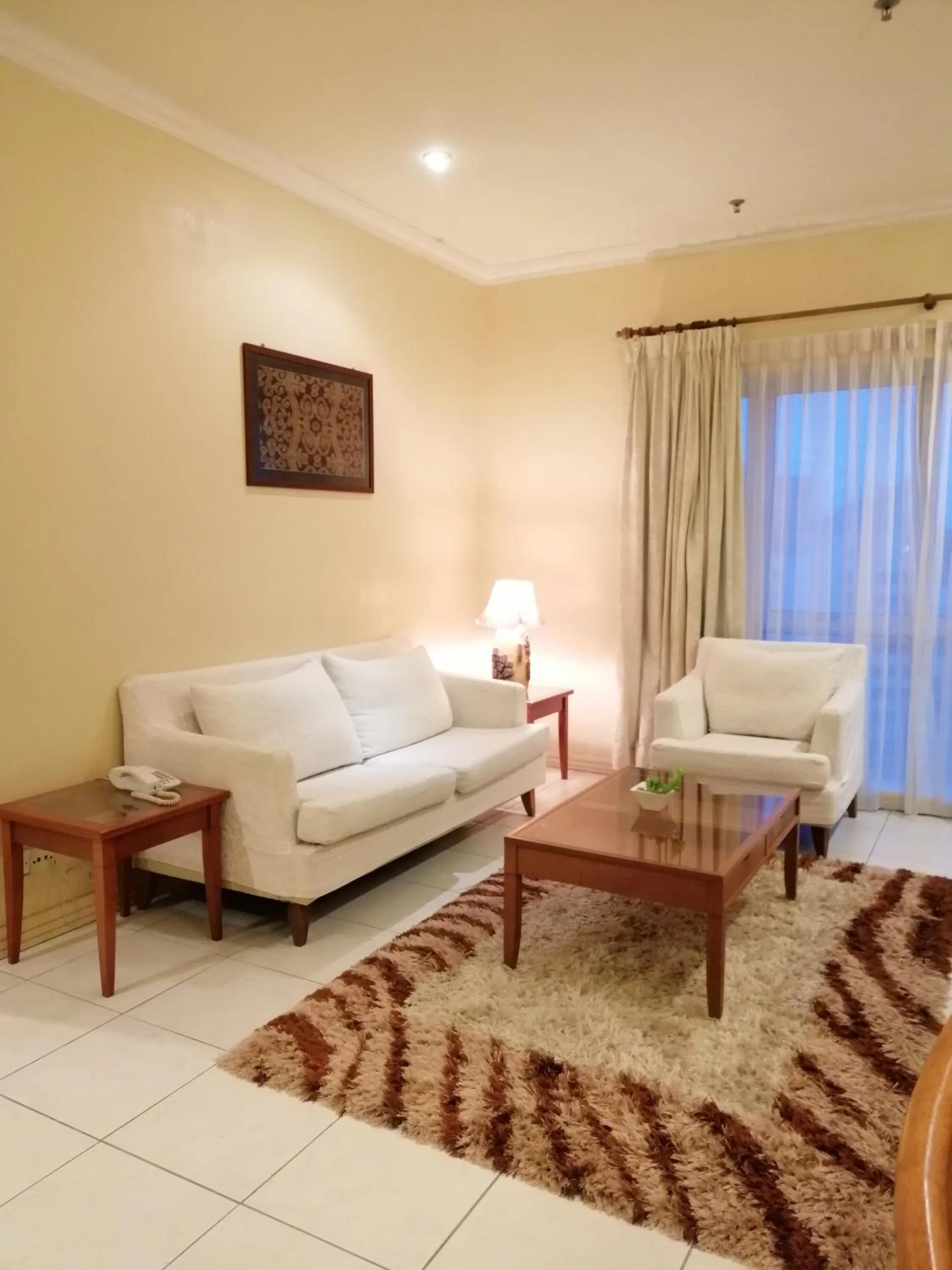 Living room in StayInn Gateway Hotel Apartment