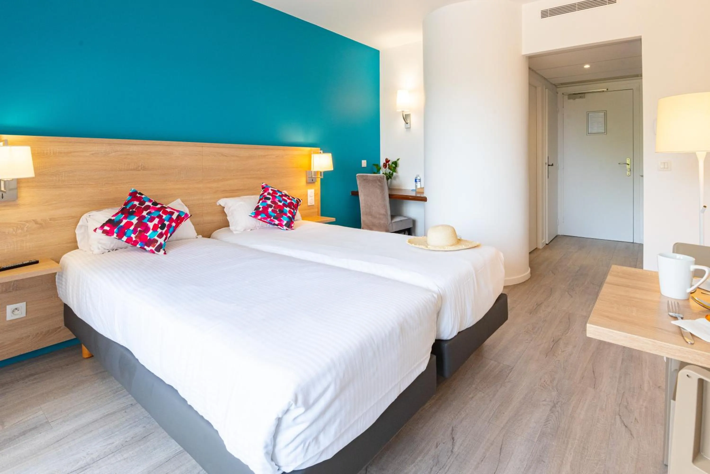 Bed in Zenitude Hôtel-Résidences Le Cannet