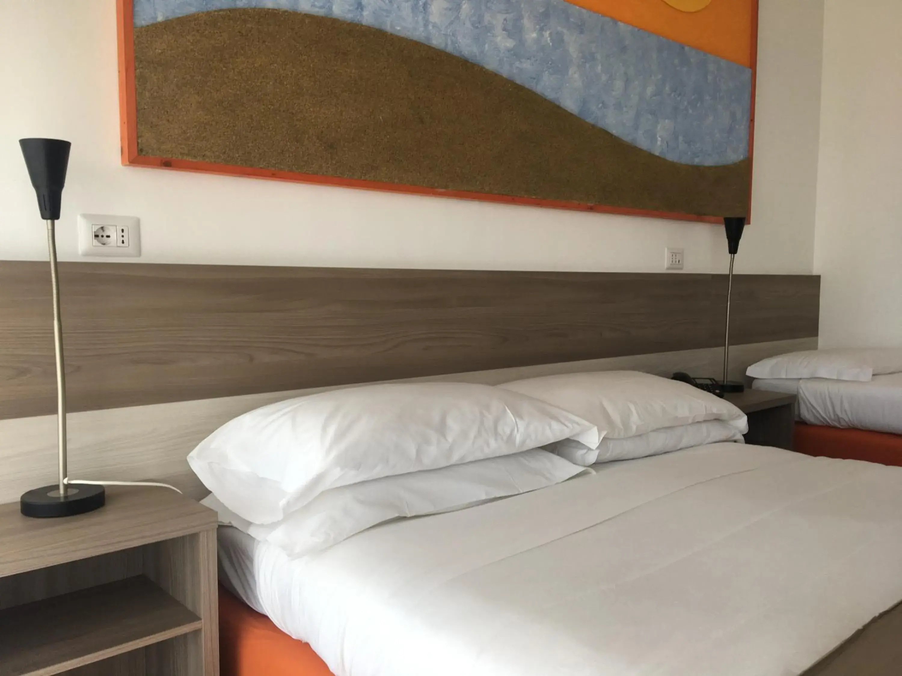 Triple Room in Hotel Corallo Triple Room in Hotel Corallo