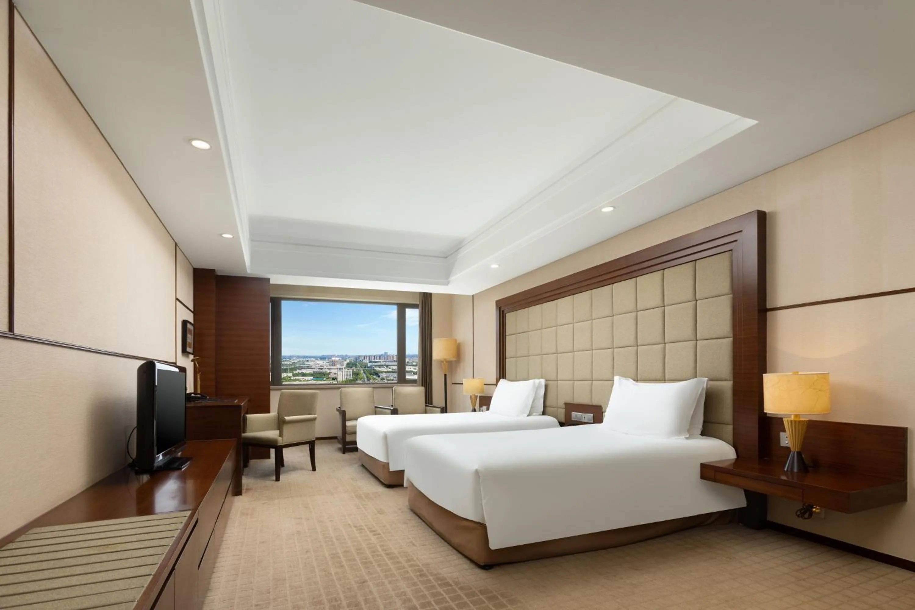 Bed in Millennium Hotel Wuxi