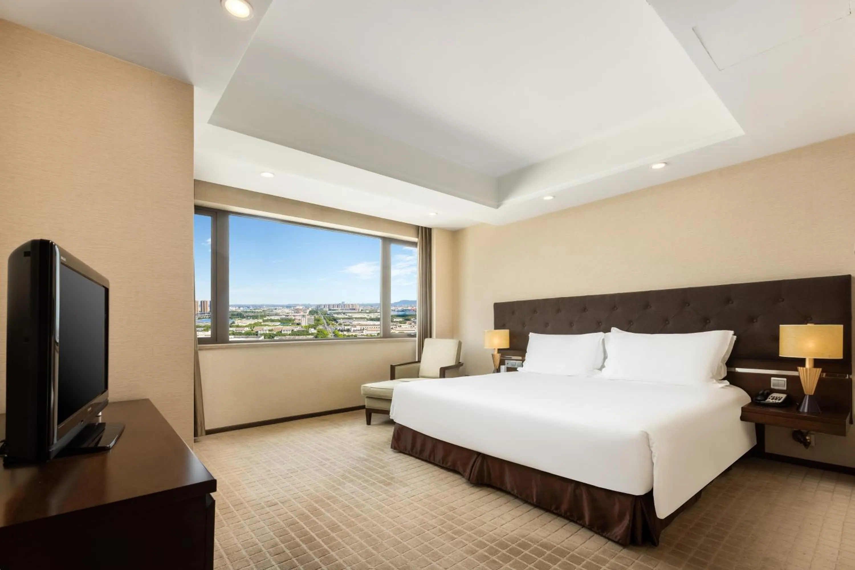 Bed in Millennium Hotel Wuxi