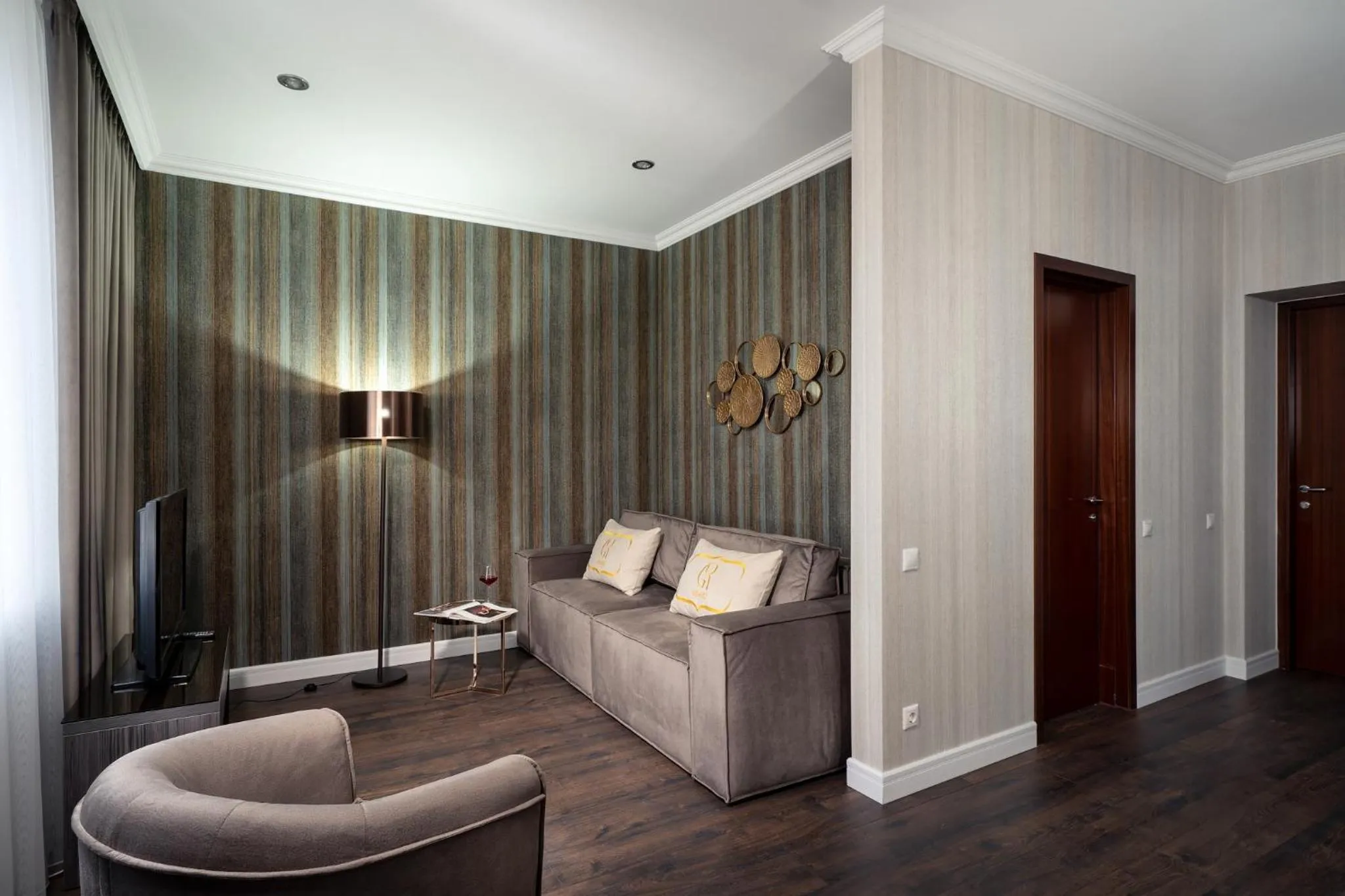 Seating area in Greguar Hotel by UHM