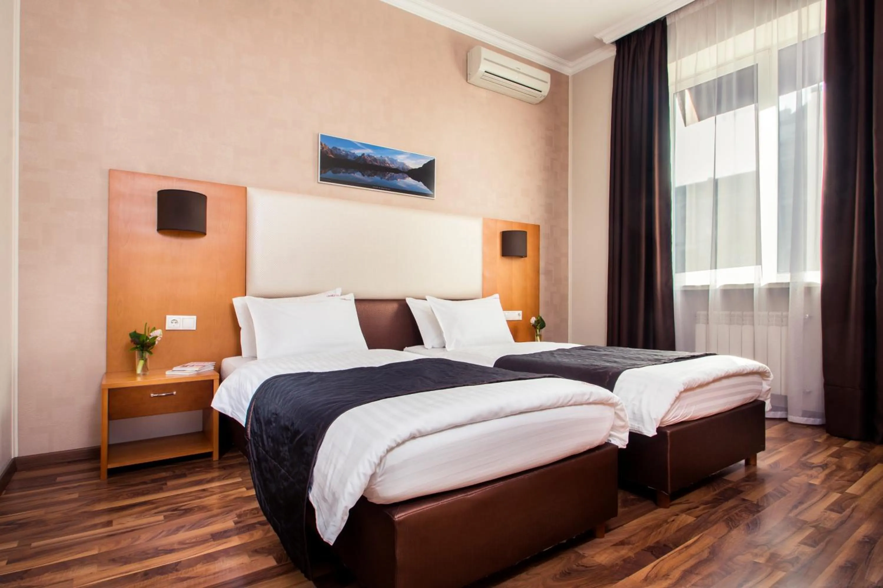 Photo of the whole room, Bed in Greguar Hotel by UHM