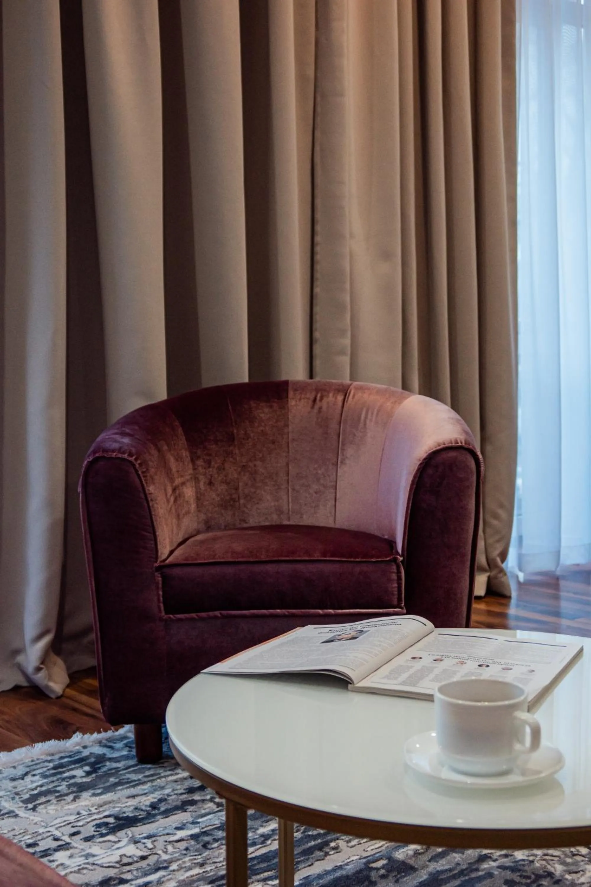 Seating area in Greguar Hotel by UHM