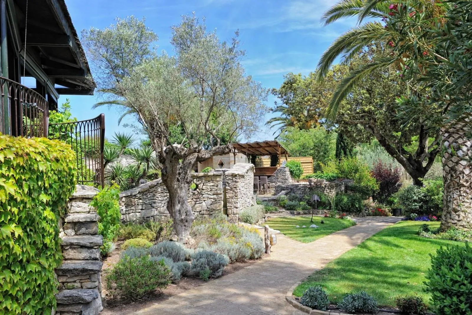 Garden in Lodge de Charme A Cheda