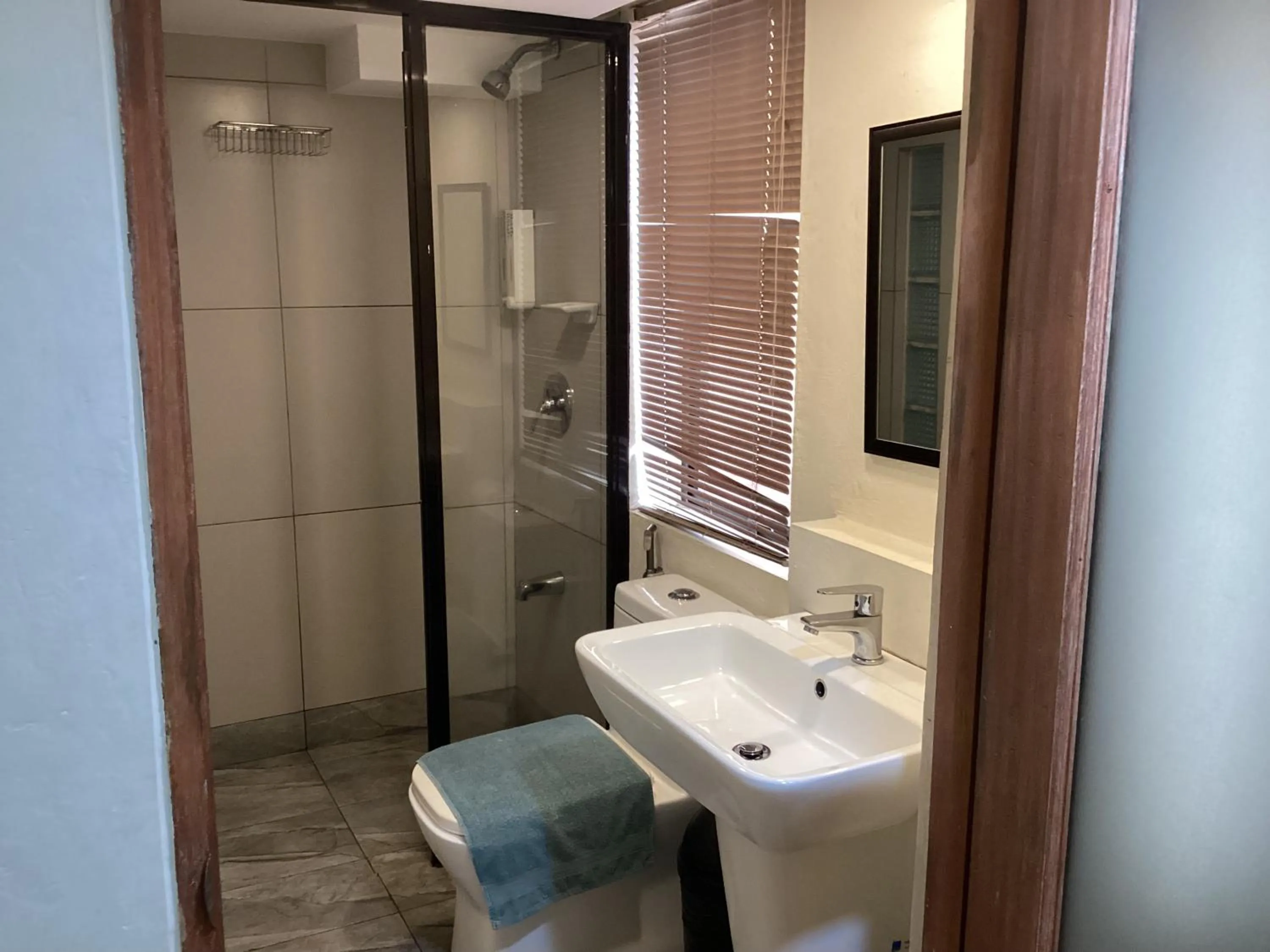 Toilet in 1775 Adriatico Suites