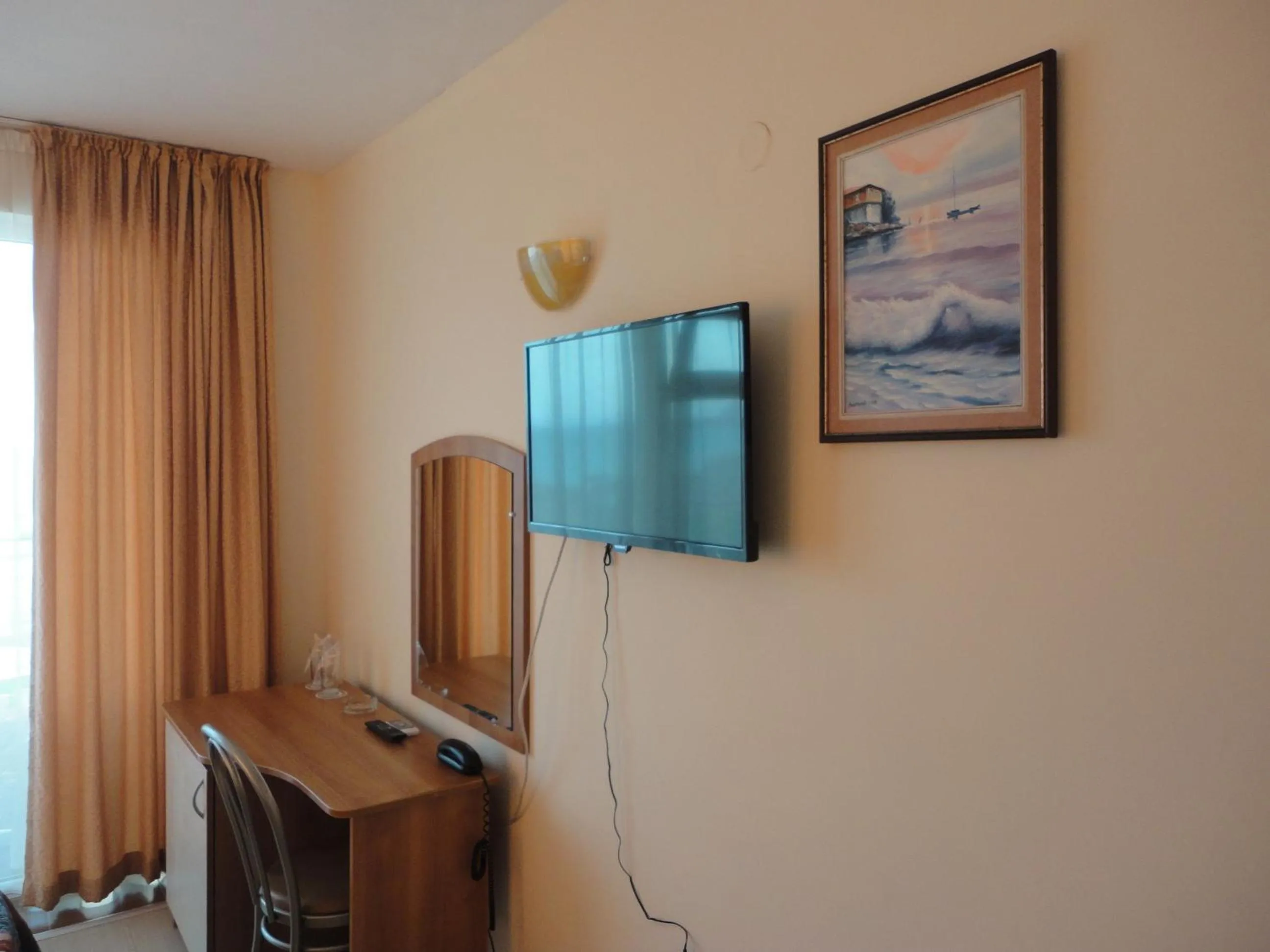 TV and multimedia in Barex Family Hotel