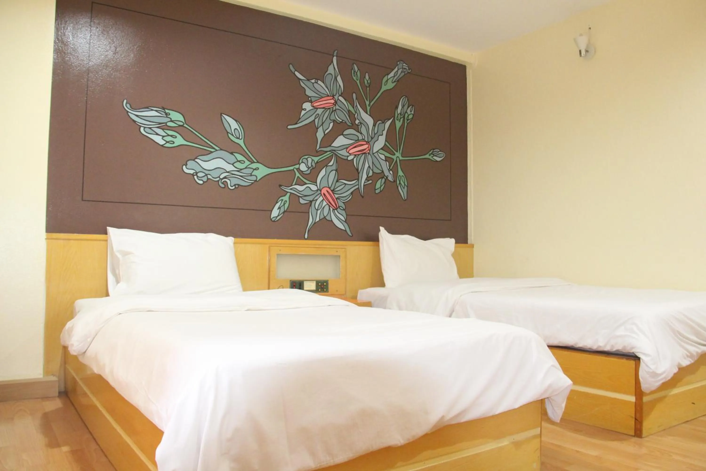 Bed in K.S.Pavilion Hotel