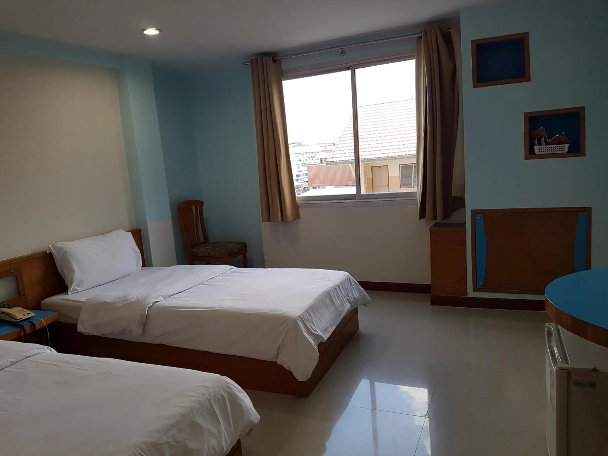 Bed in K.S.Pavilion Hotel