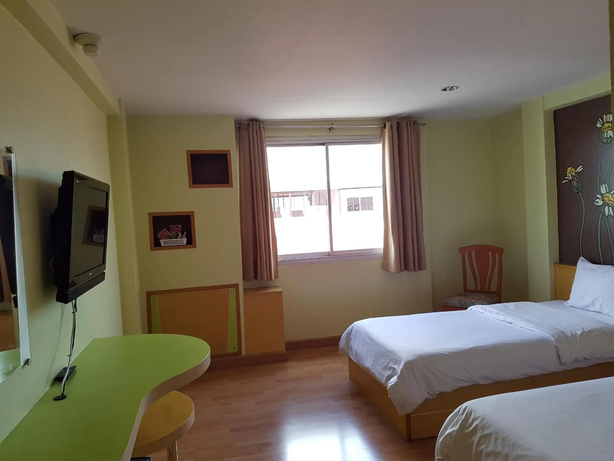 Bed in K.S.Pavilion Hotel