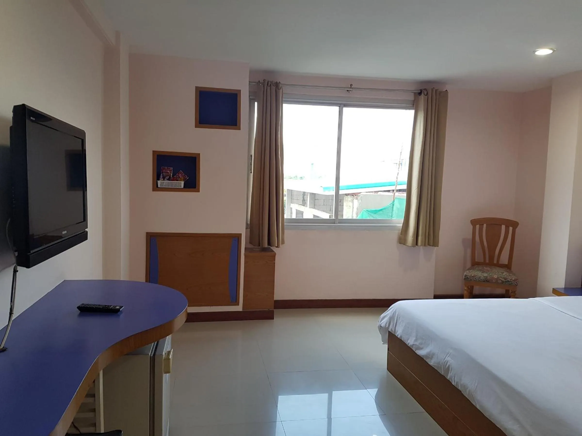 Bed in K.S.Pavilion Hotel