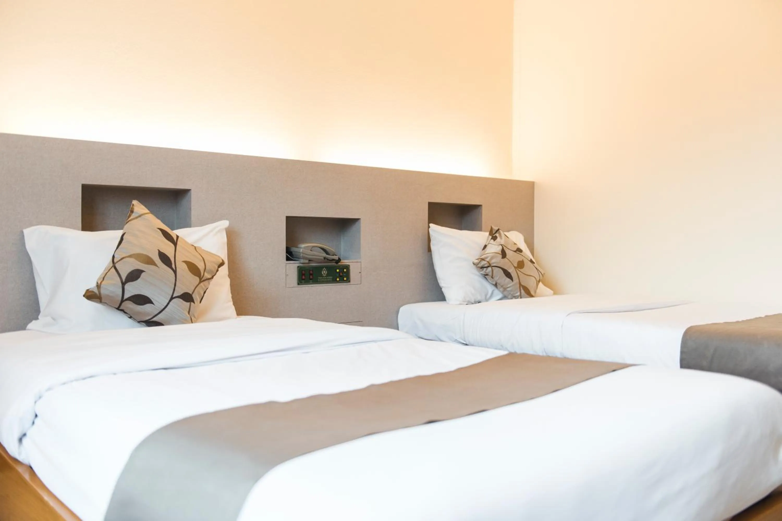 Bed in K.S.Pavilion Hotel