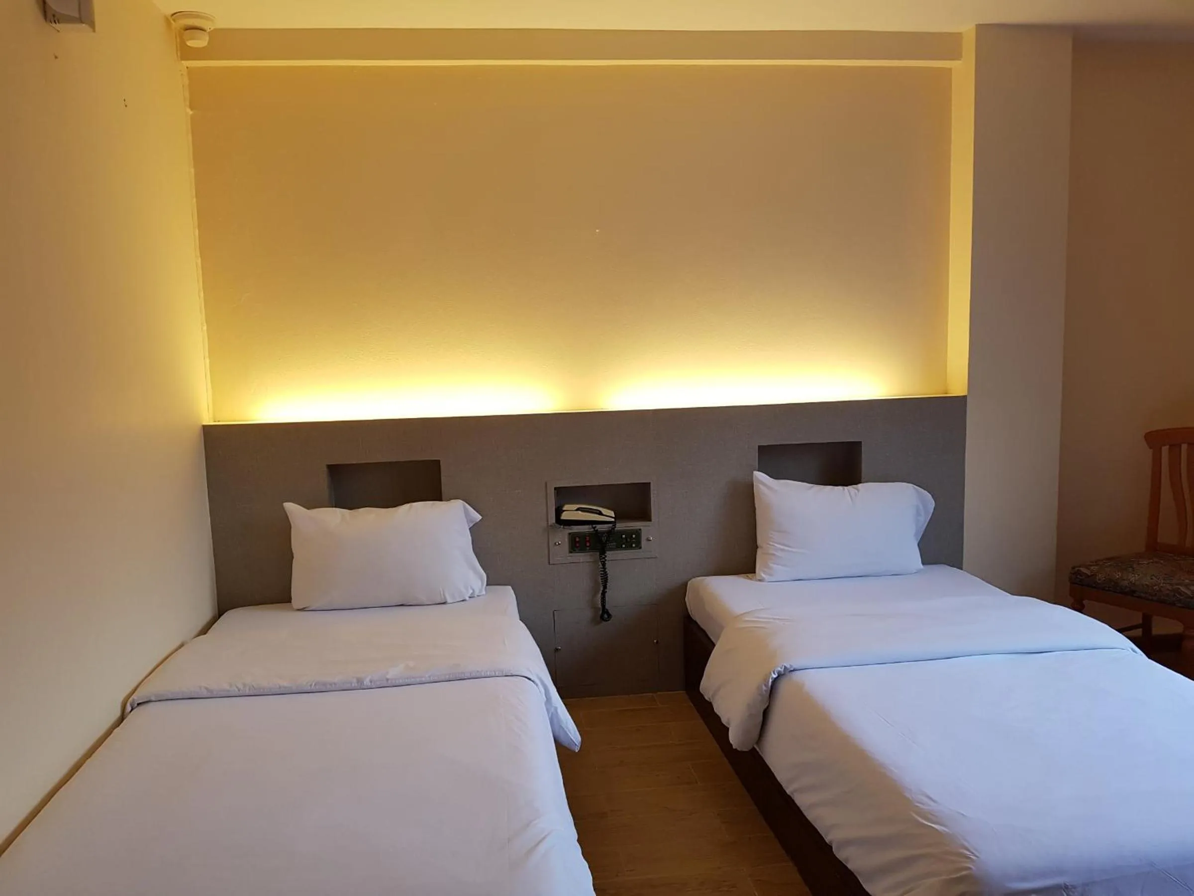 Bed in K.S.Pavilion Hotel