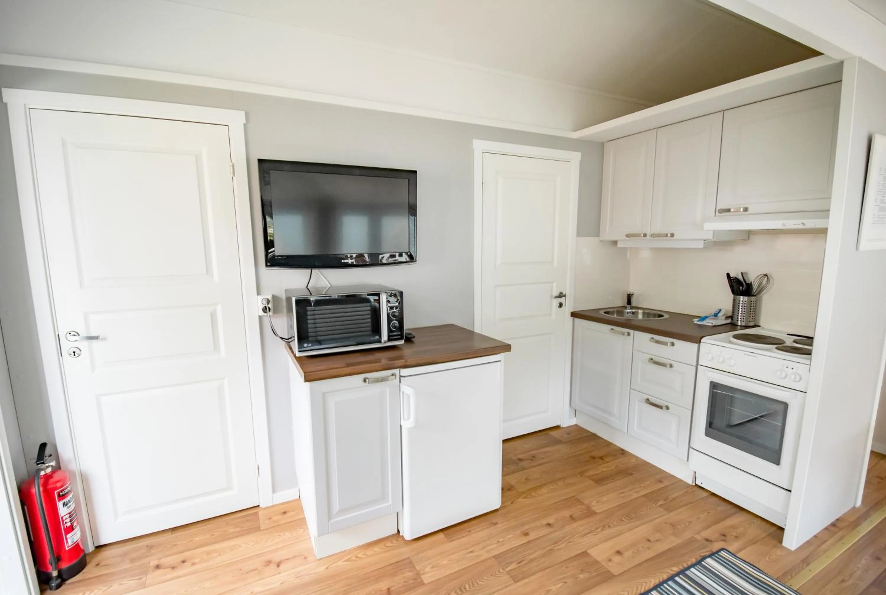 Kitchen or kitchenette in Grande Hytteutleige og Camping