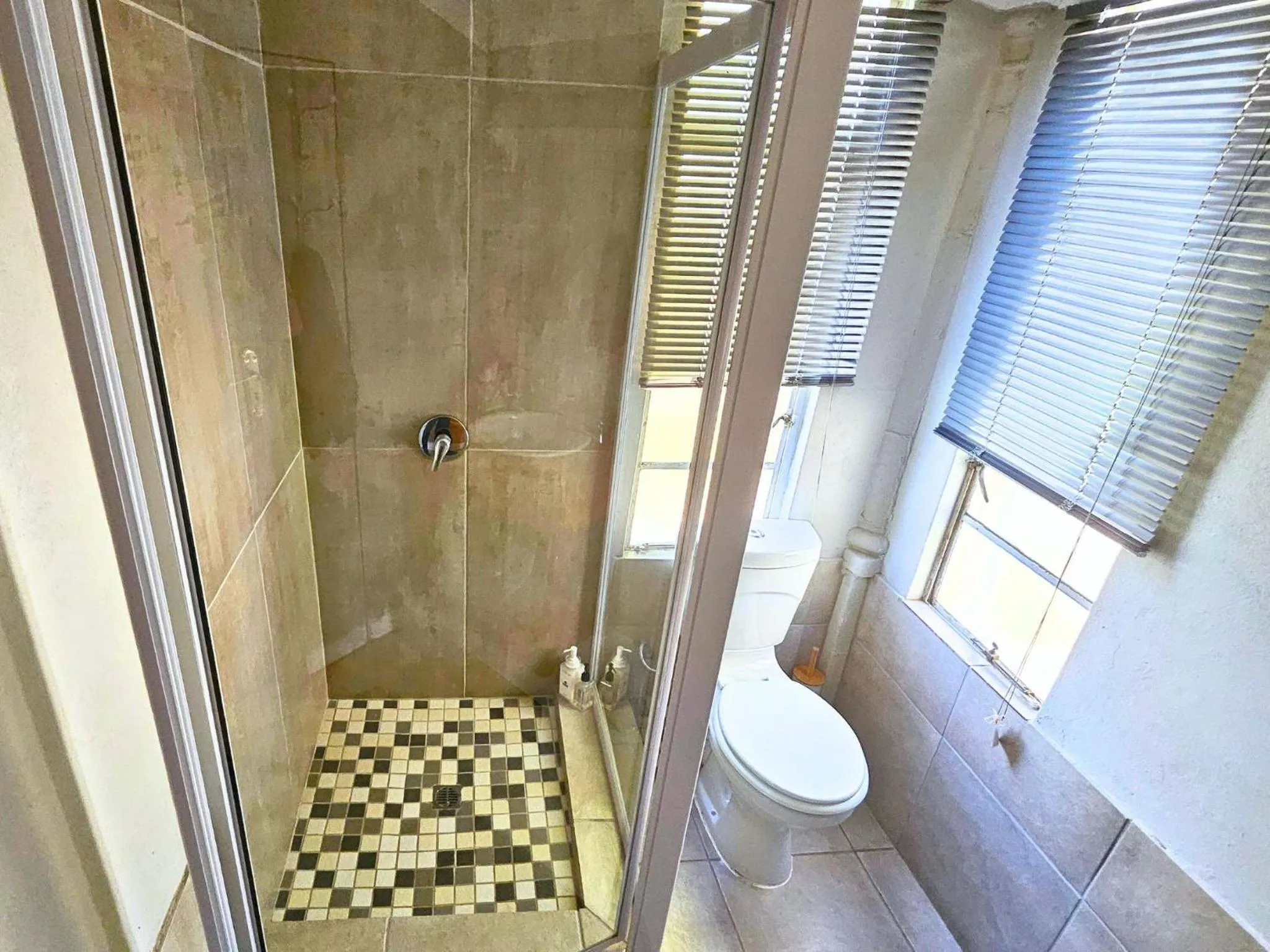 Shower in The Browns' Luxury Suites & Cottage