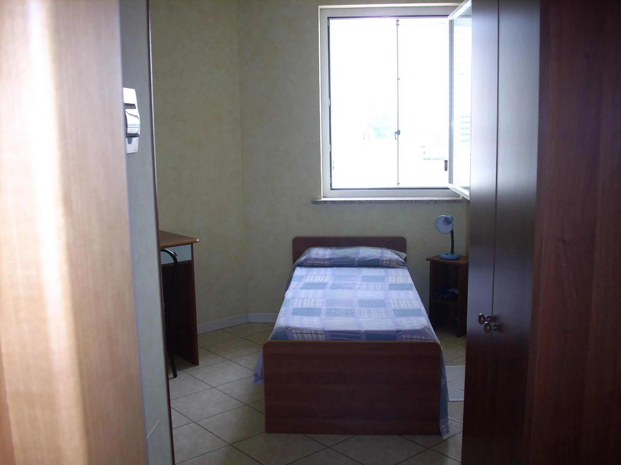 Bed in Il Bivio Hotel