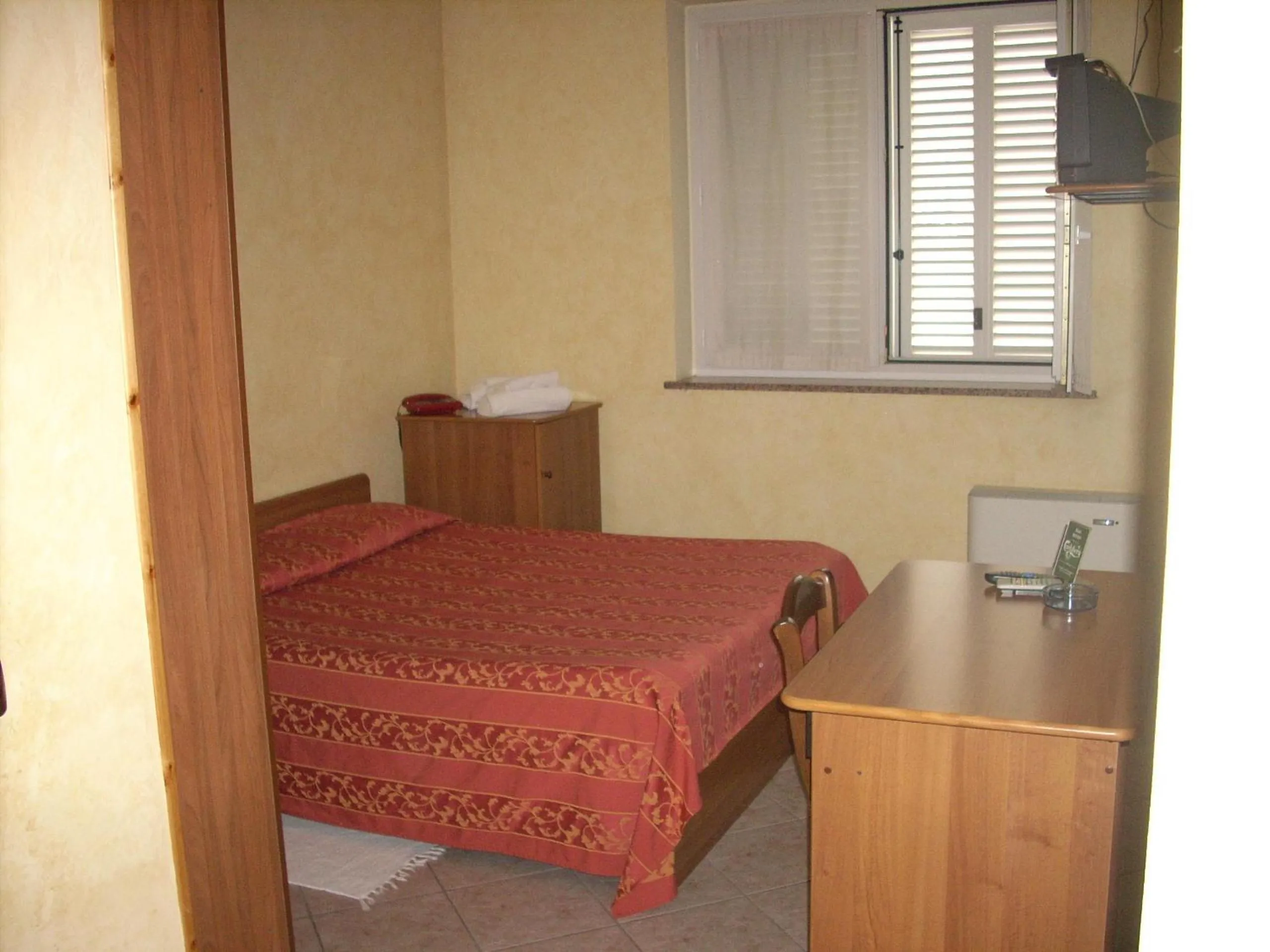 Bed in Il Bivio Hotel