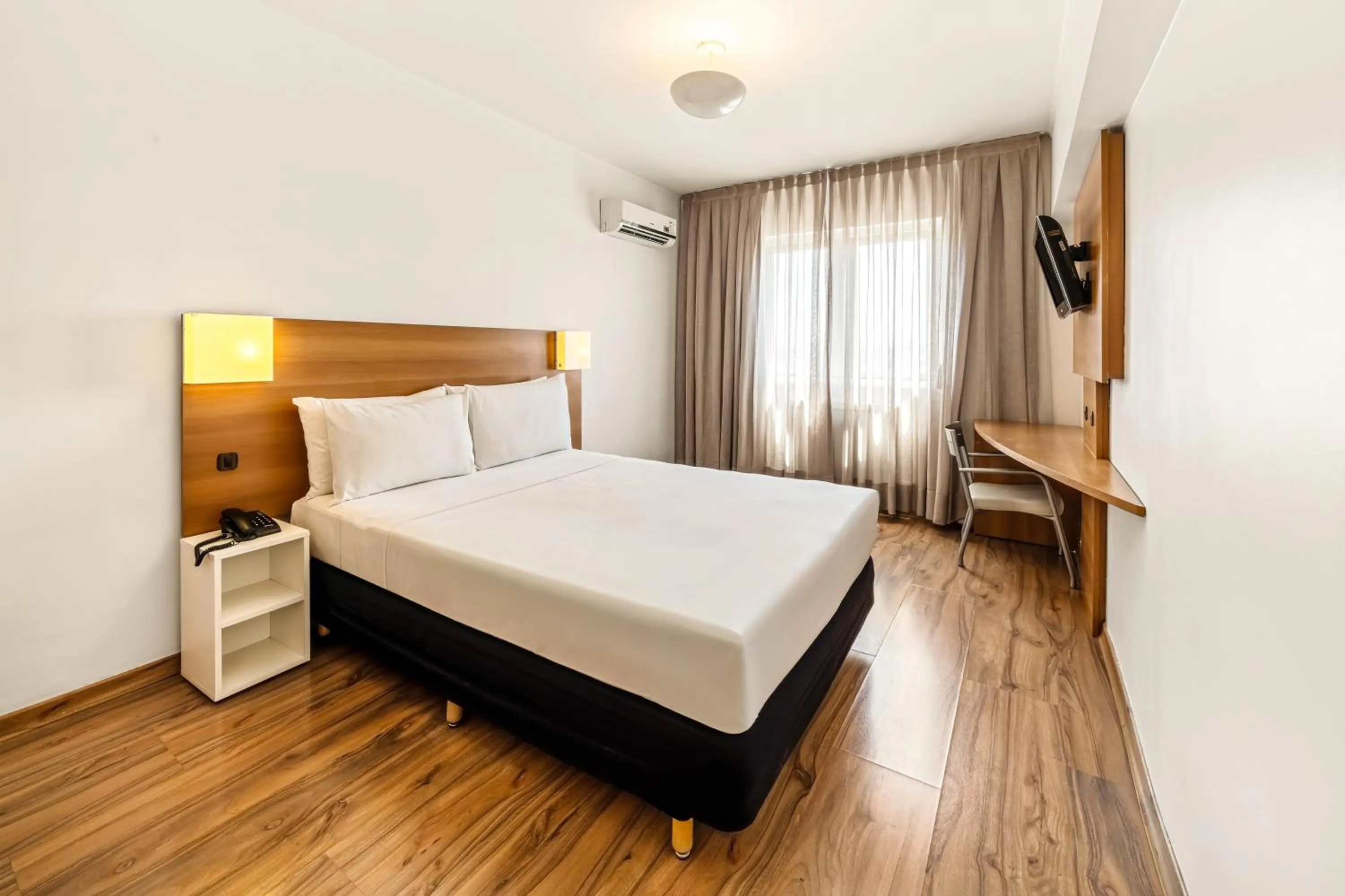 Bed in Slim Hotel São Paulo Congonhas