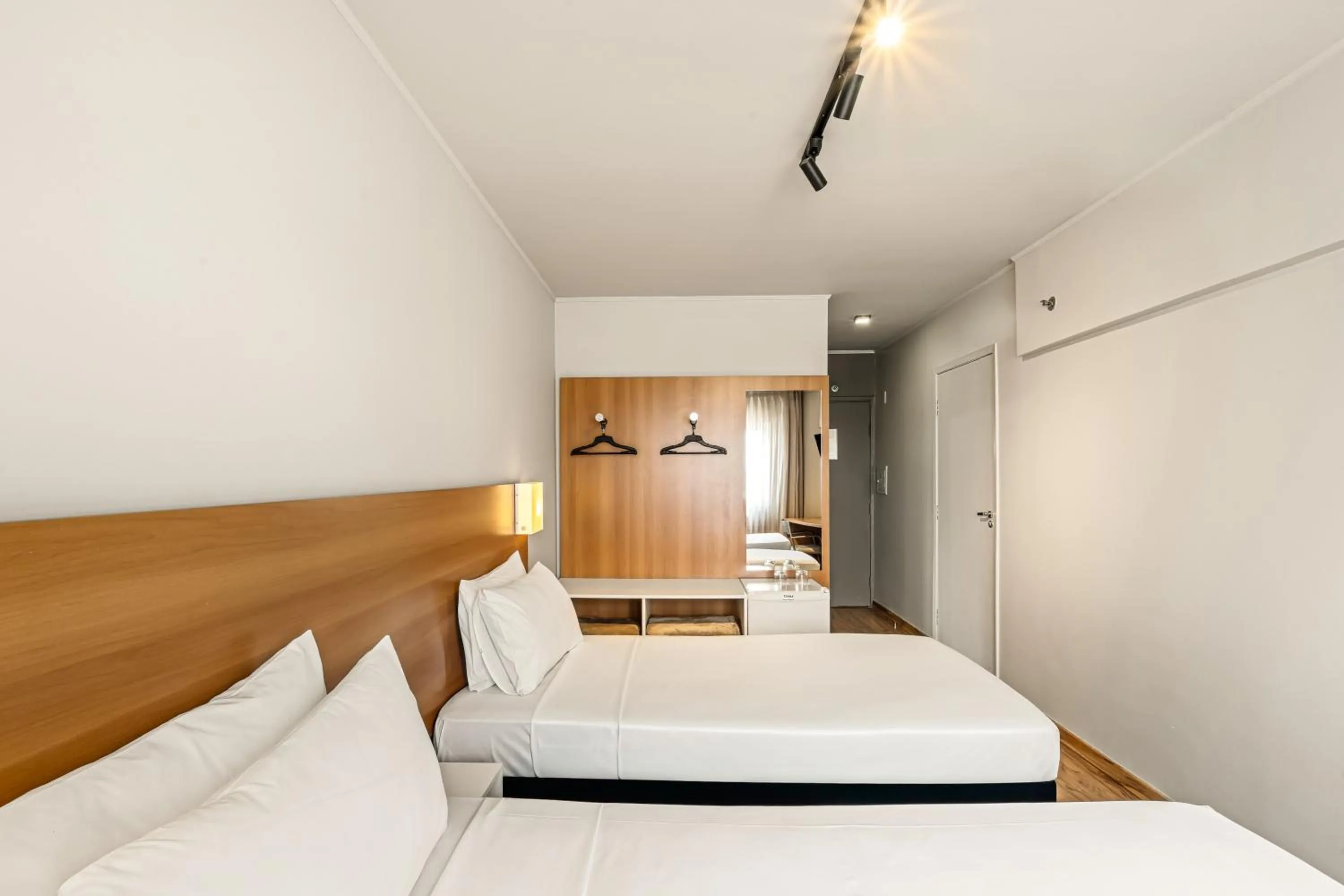 Bed in Slim Hotel São Paulo Congonhas