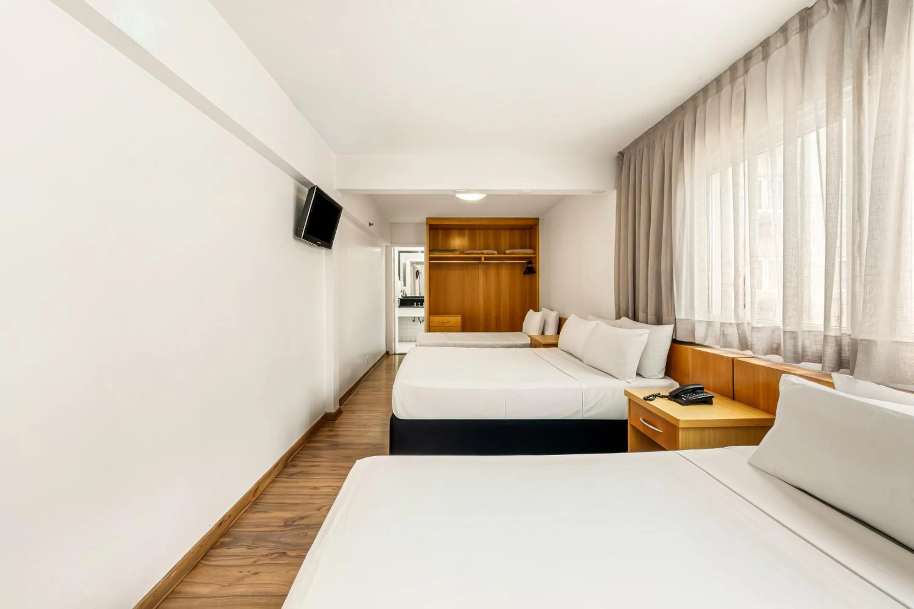 Bed in Slim Hotel São Paulo Congonhas