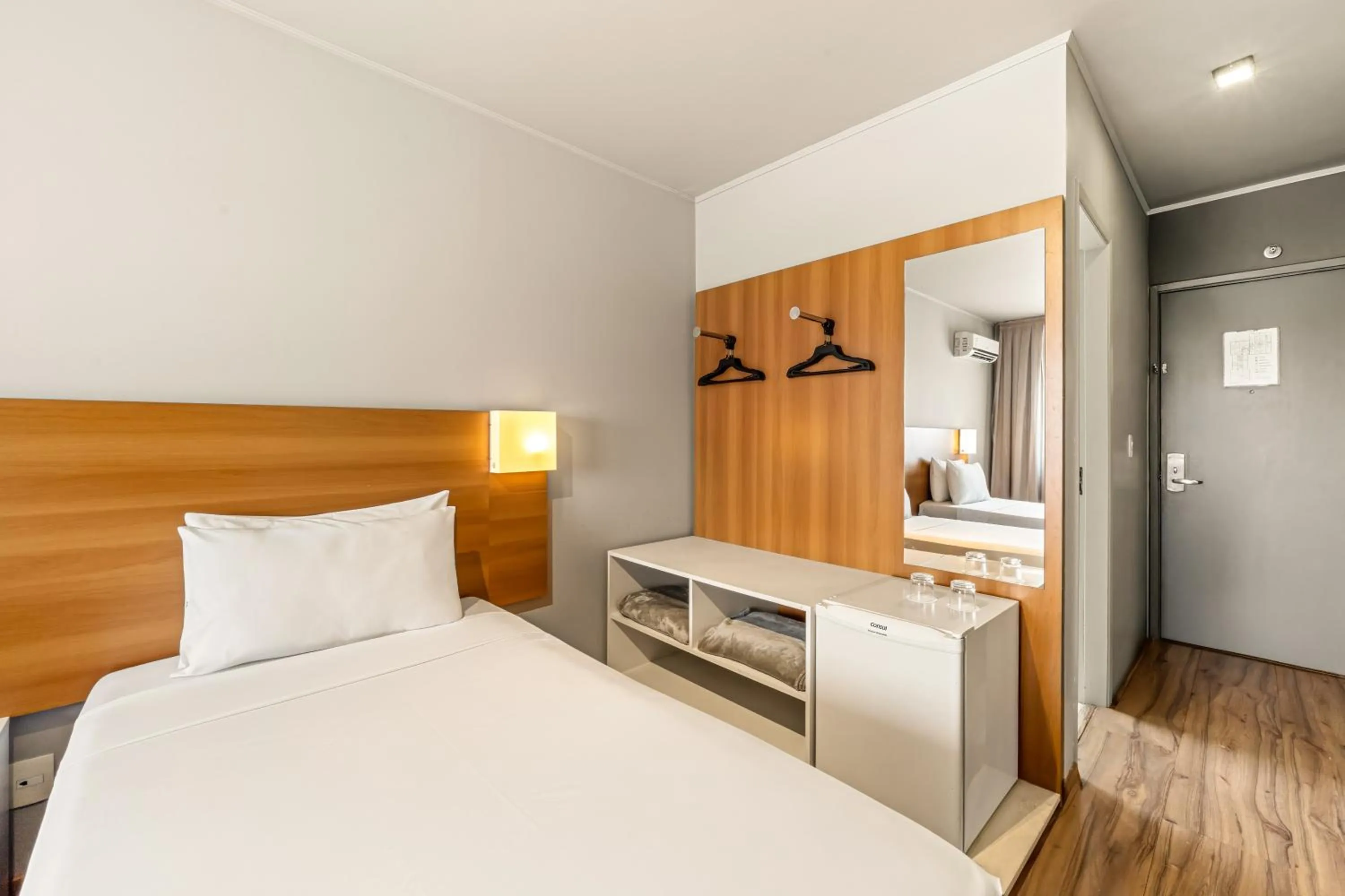 Bed in Slim Hotel São Paulo Congonhas