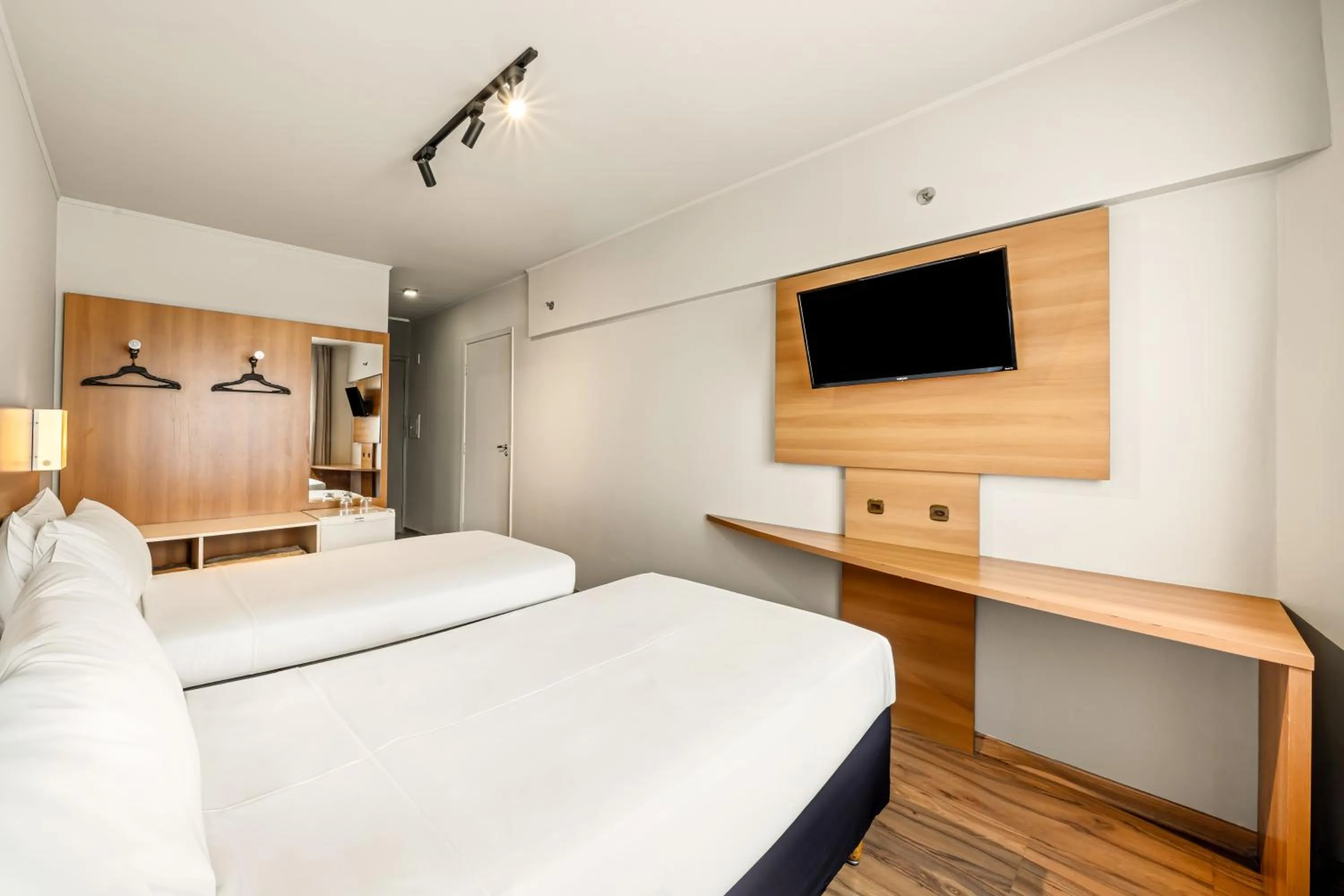 Bed in Slim Hotel São Paulo Congonhas