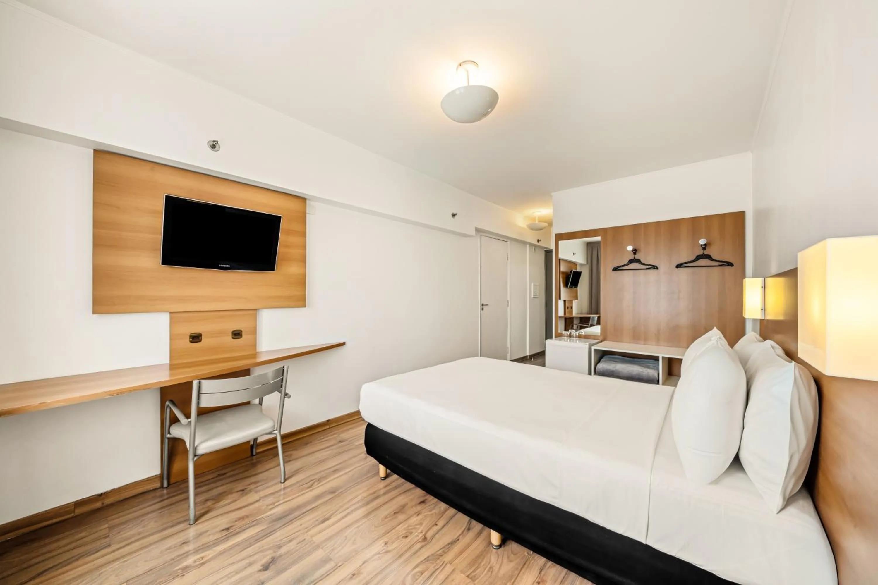 Bed in Slim Hotel São Paulo Congonhas