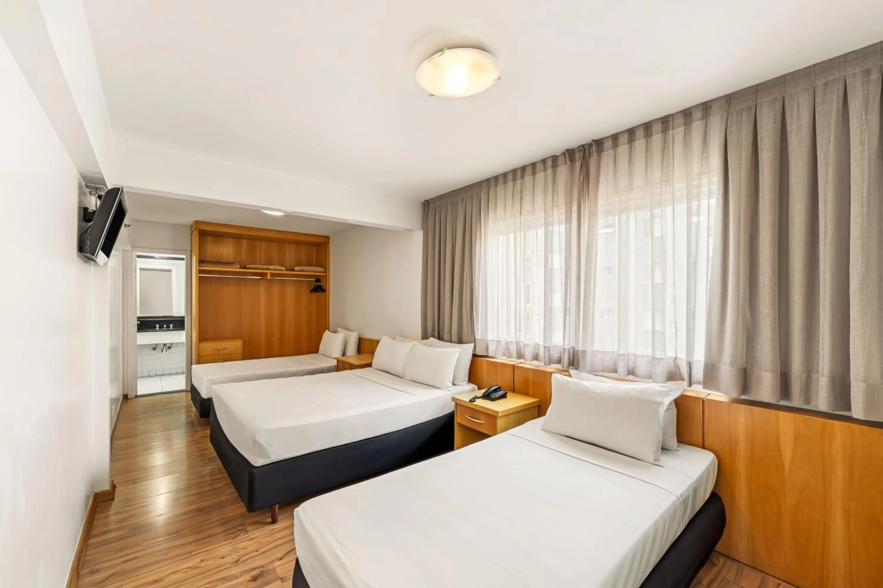 Bed in Slim Hotel São Paulo Congonhas