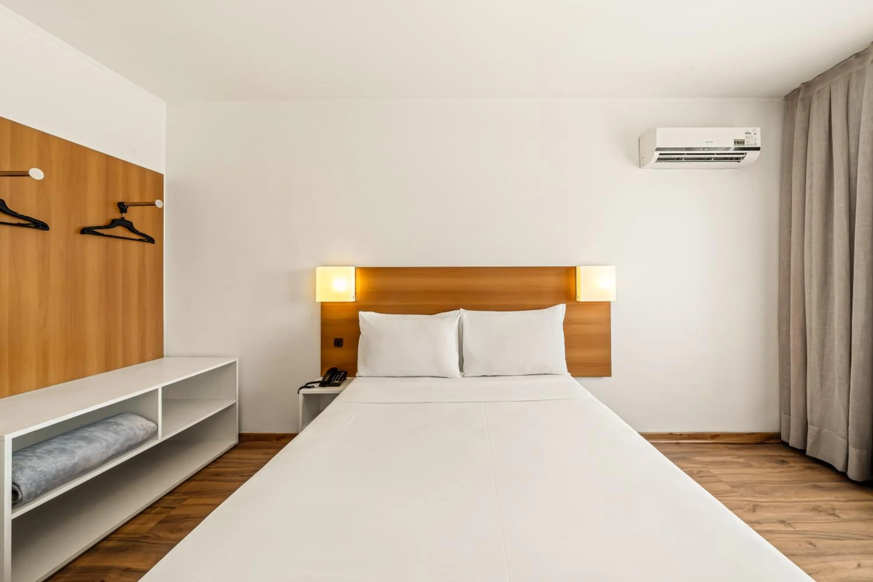 Bed in Slim Hotel São Paulo Congonhas