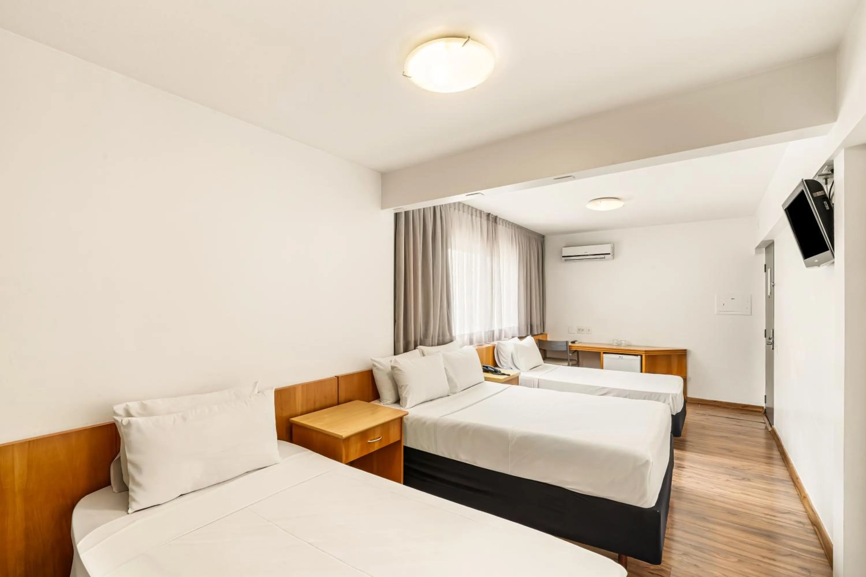 Bed in Slim Hotel São Paulo Congonhas