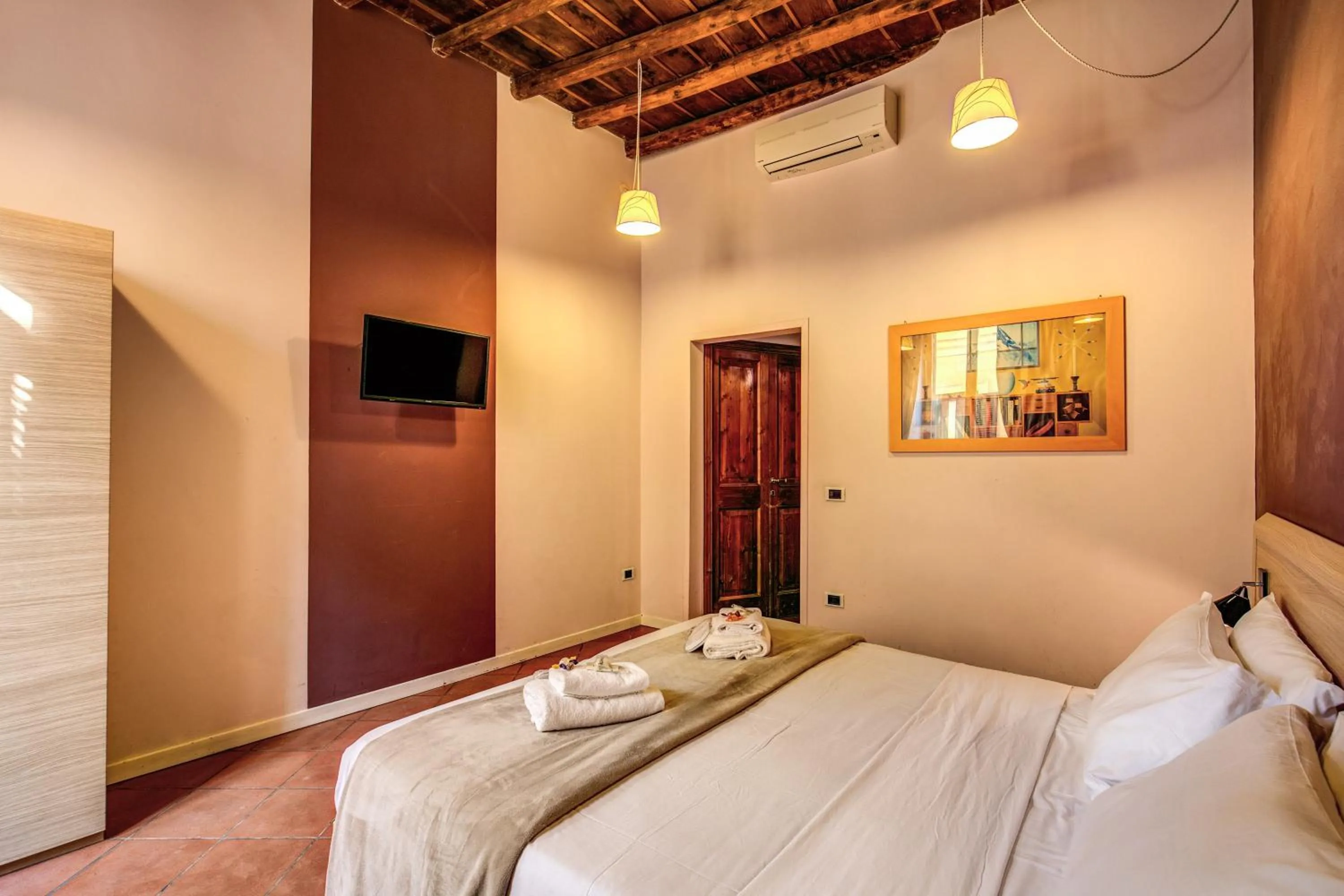 Bed in Guest House o Affittacamere Magenta Fico 2