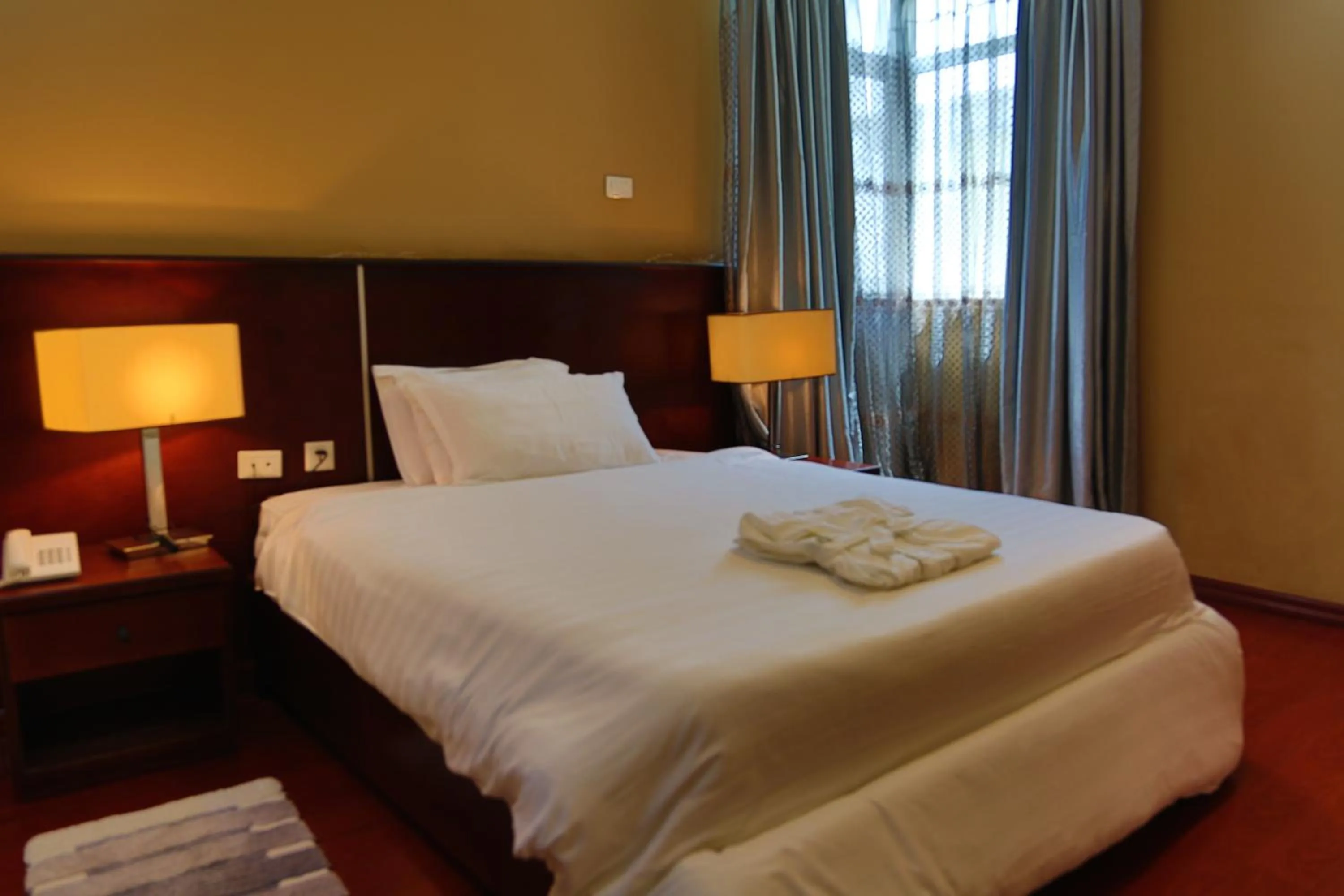 Bedroom in Yinm Furnished Apartment