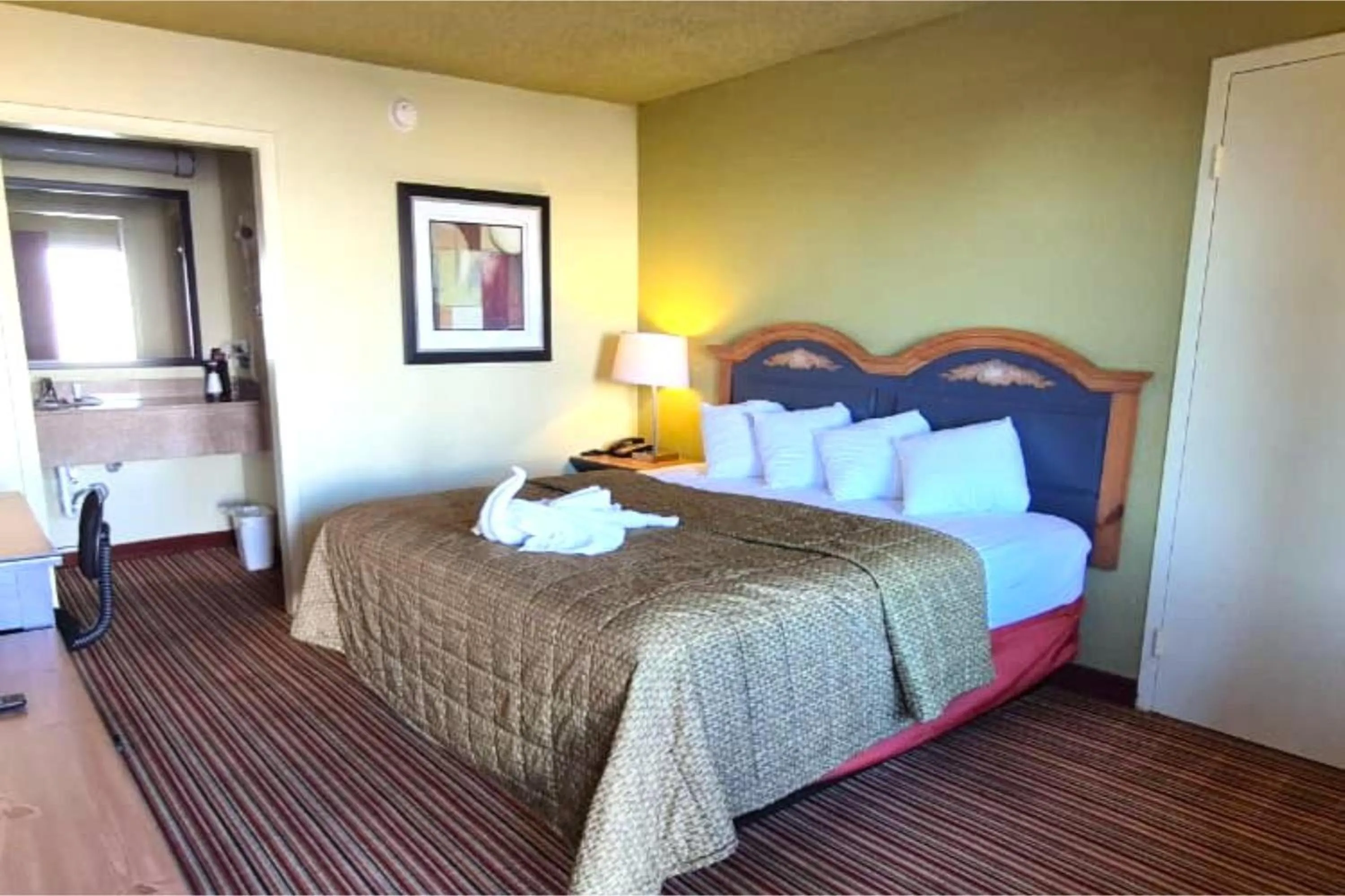 Bedroom, Bed in Suite Dreams Motel By Capital O Mattoon I - 57