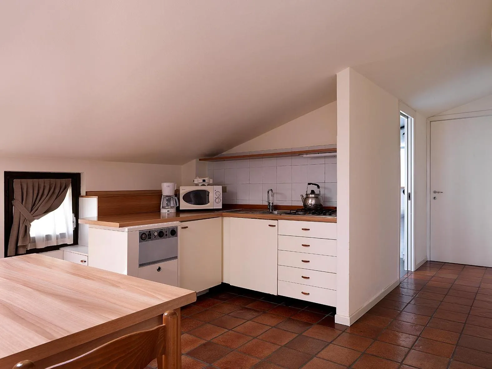 Kitchen or kitchenette in Residence Il Melograno