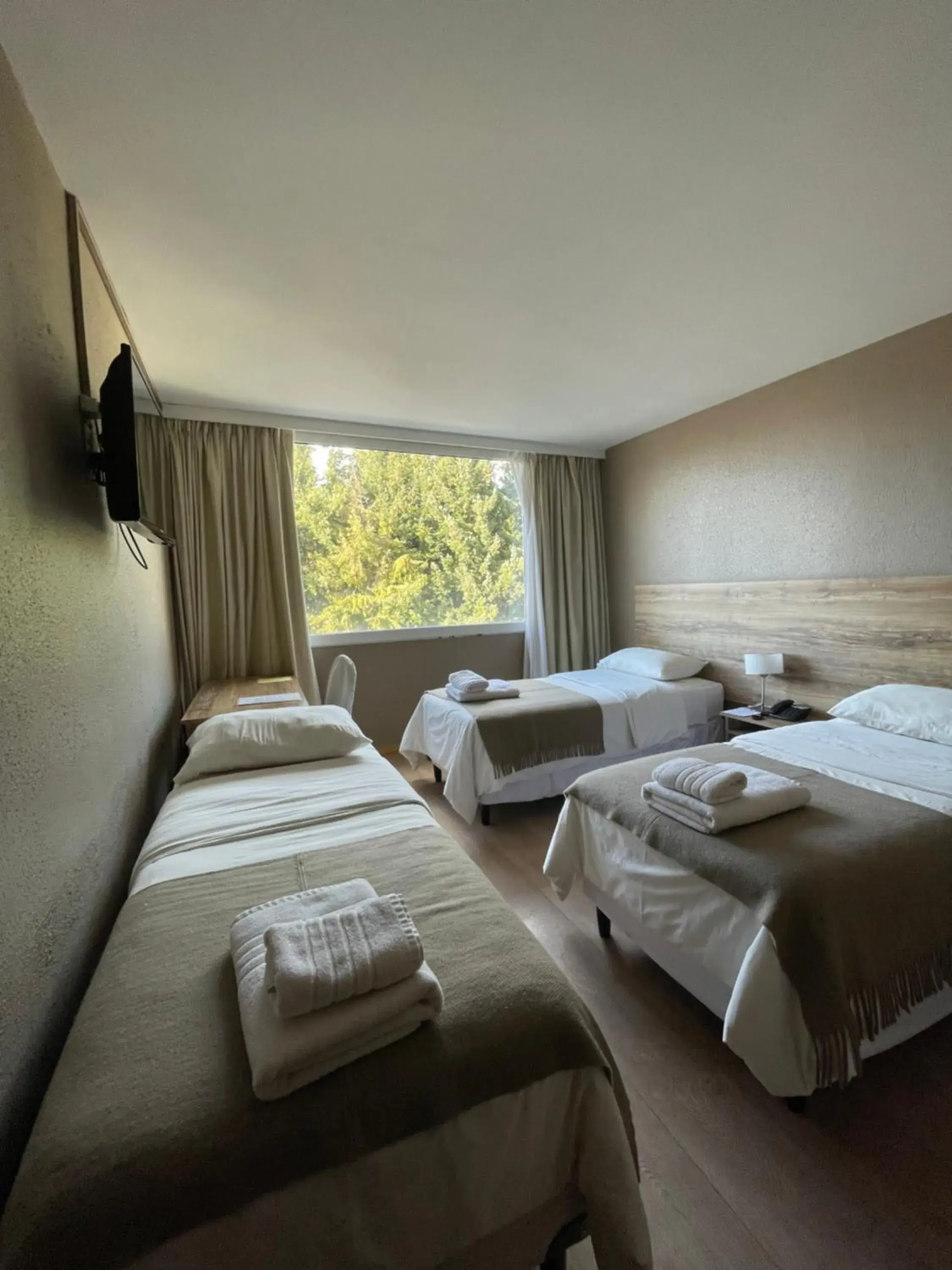 Triple Room in Hotel Tehuelche Triple Room in Hotel Tehuelche