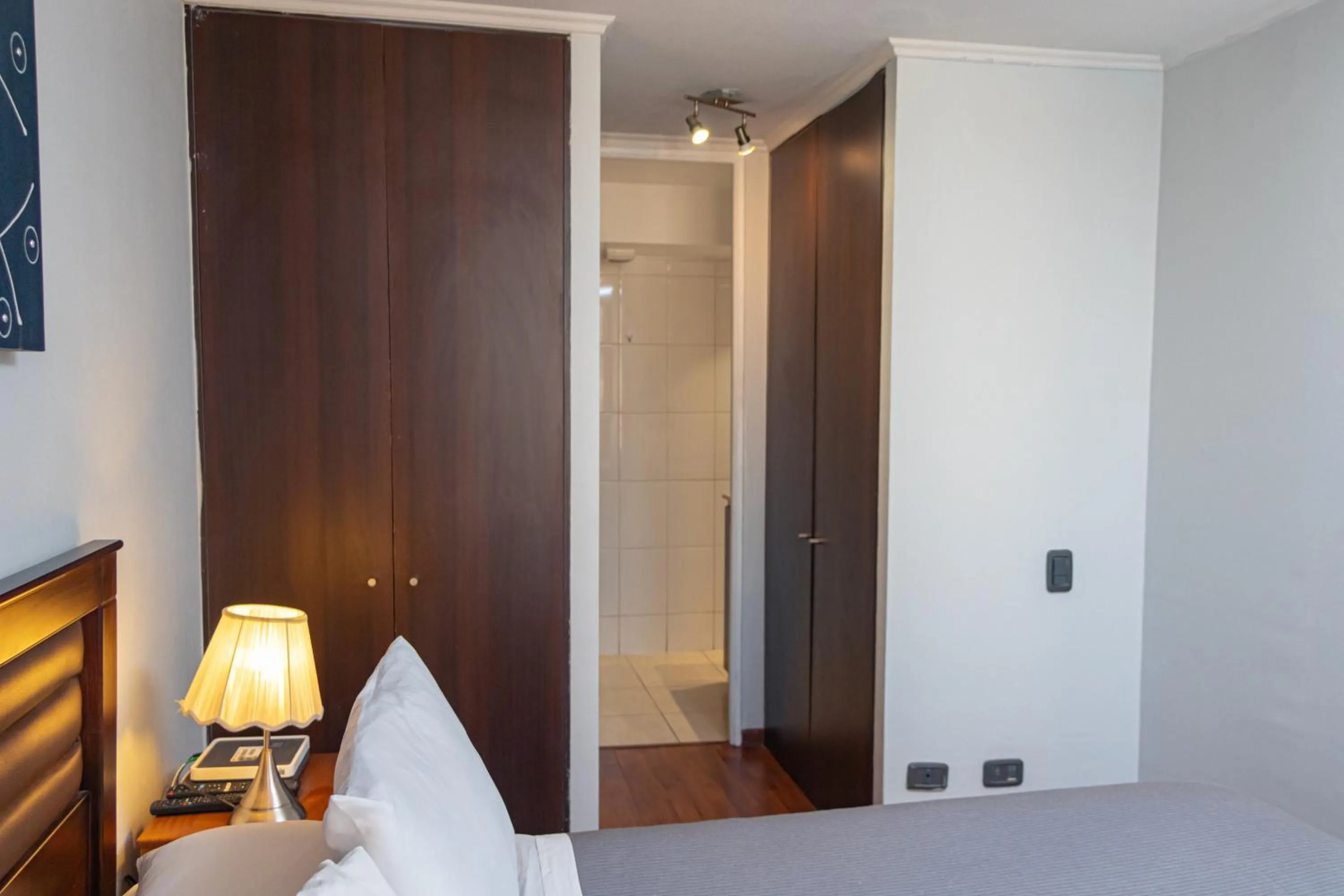 Bedroom, Bed in Departamentos Amoblados Torre Tagle