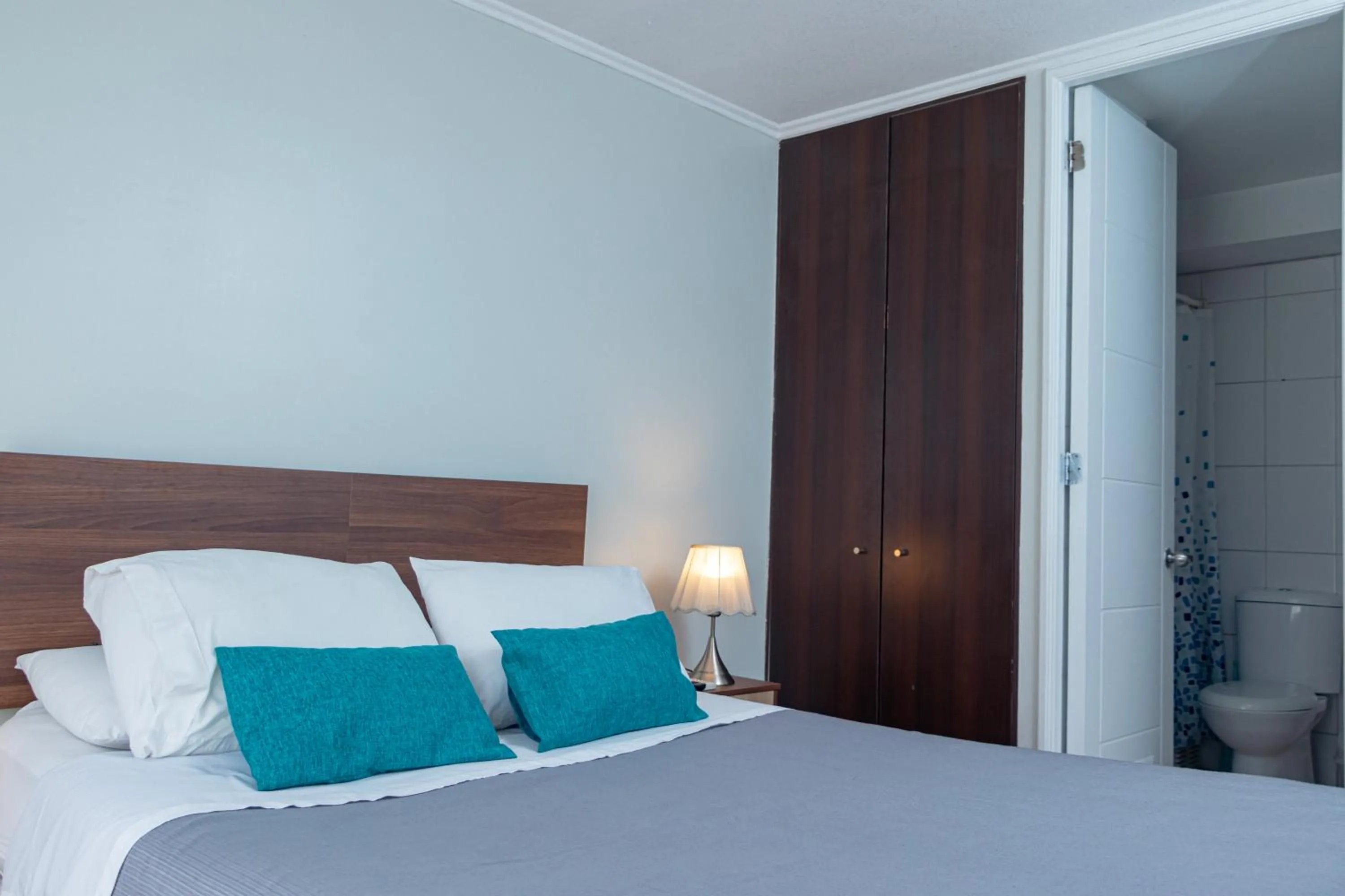 wardrobe, Bed in Departamentos Amoblados Torre Tagle