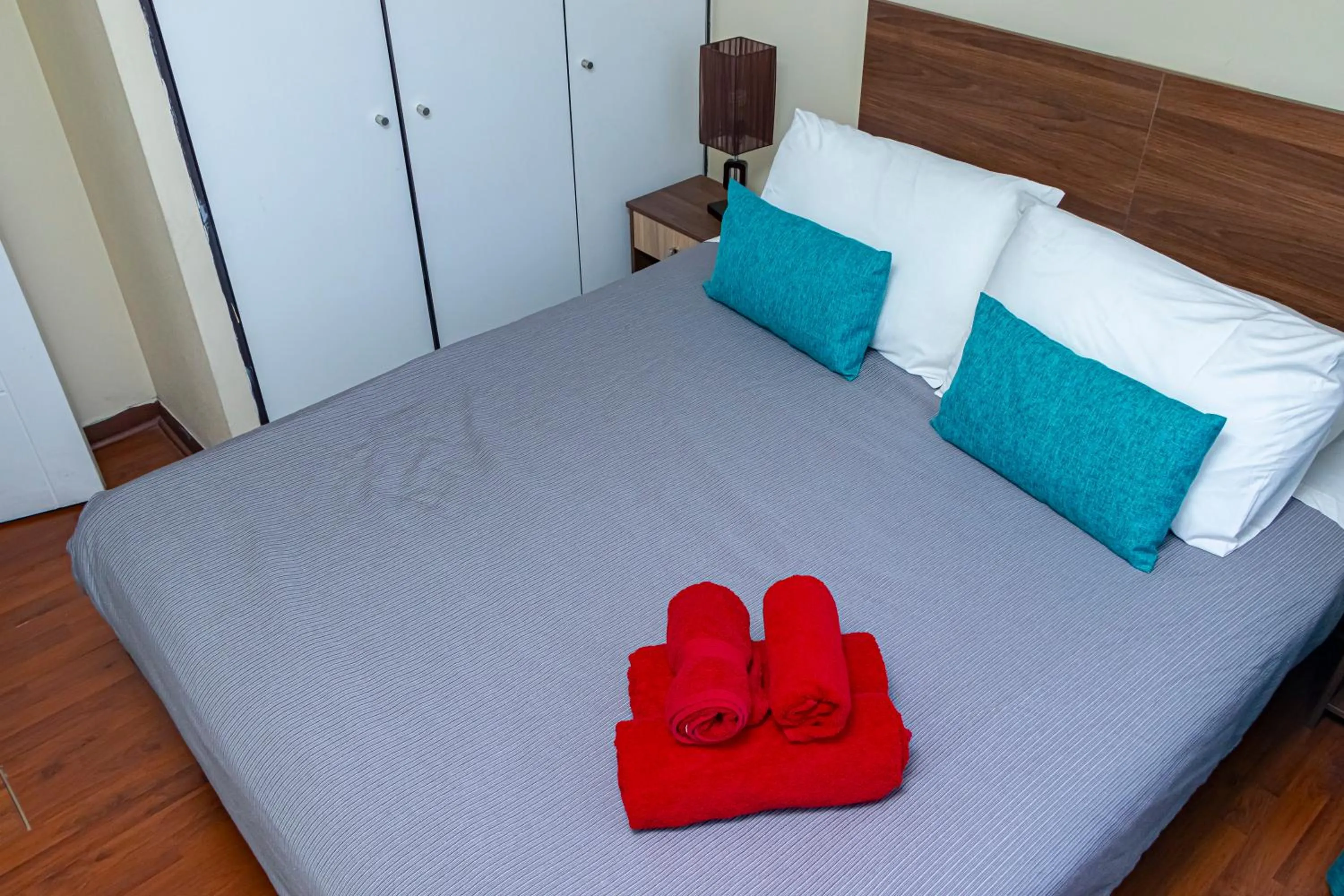 Bedroom, Bed in Departamentos Amoblados Torre Tagle