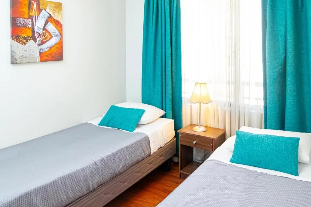 Bed in Departamentos Amoblados Torre Tagle