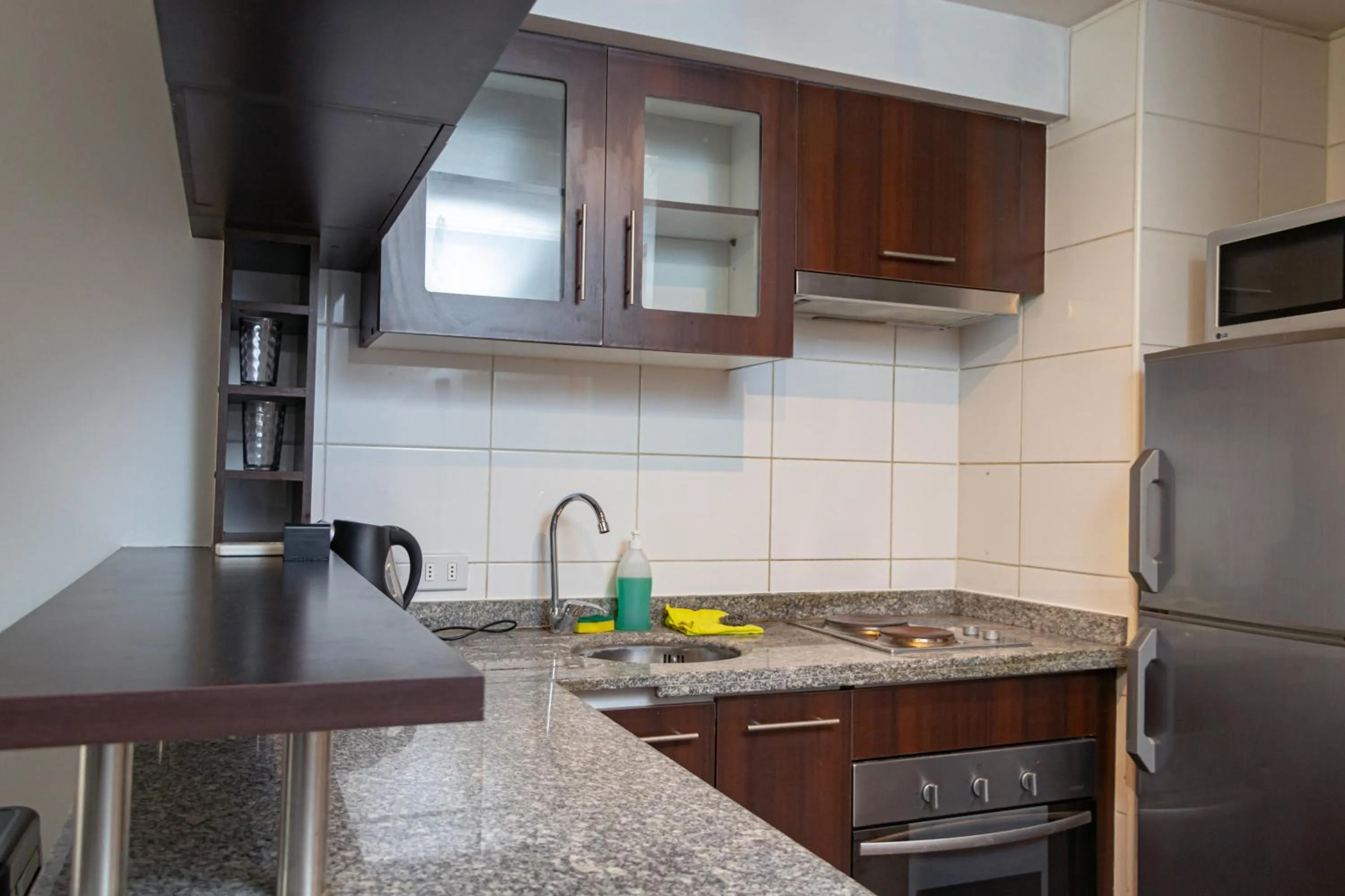 Kitchen or kitchenette in Departamentos Amoblados Torre Tagle
