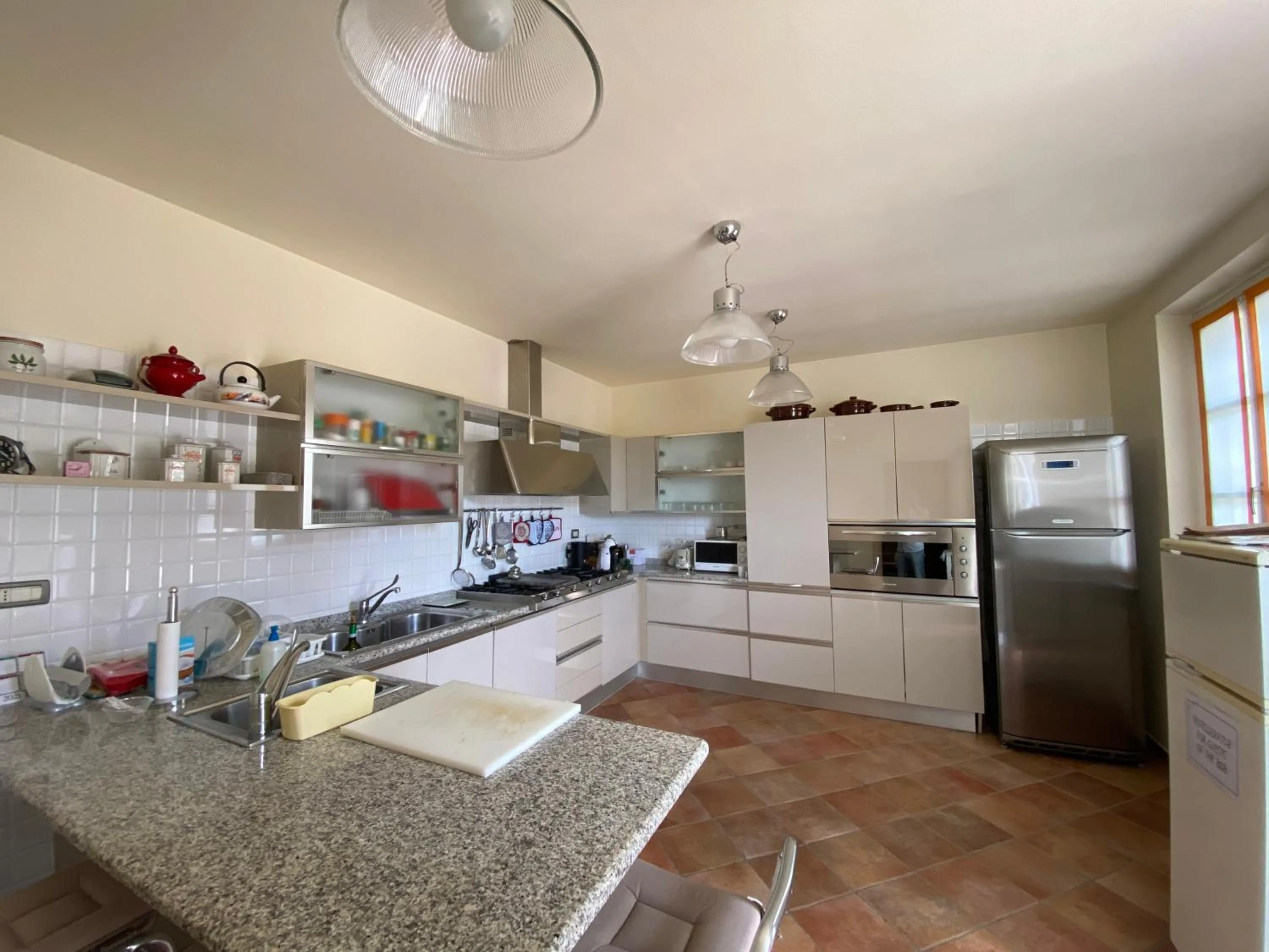 Kitchen or kitchenette in La Mondianese "House of Ruchè"