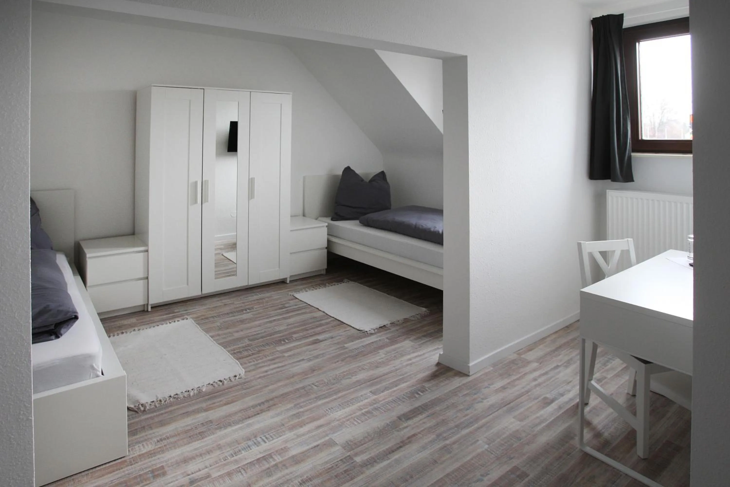 Bed in Aparthotel Peerless Dine